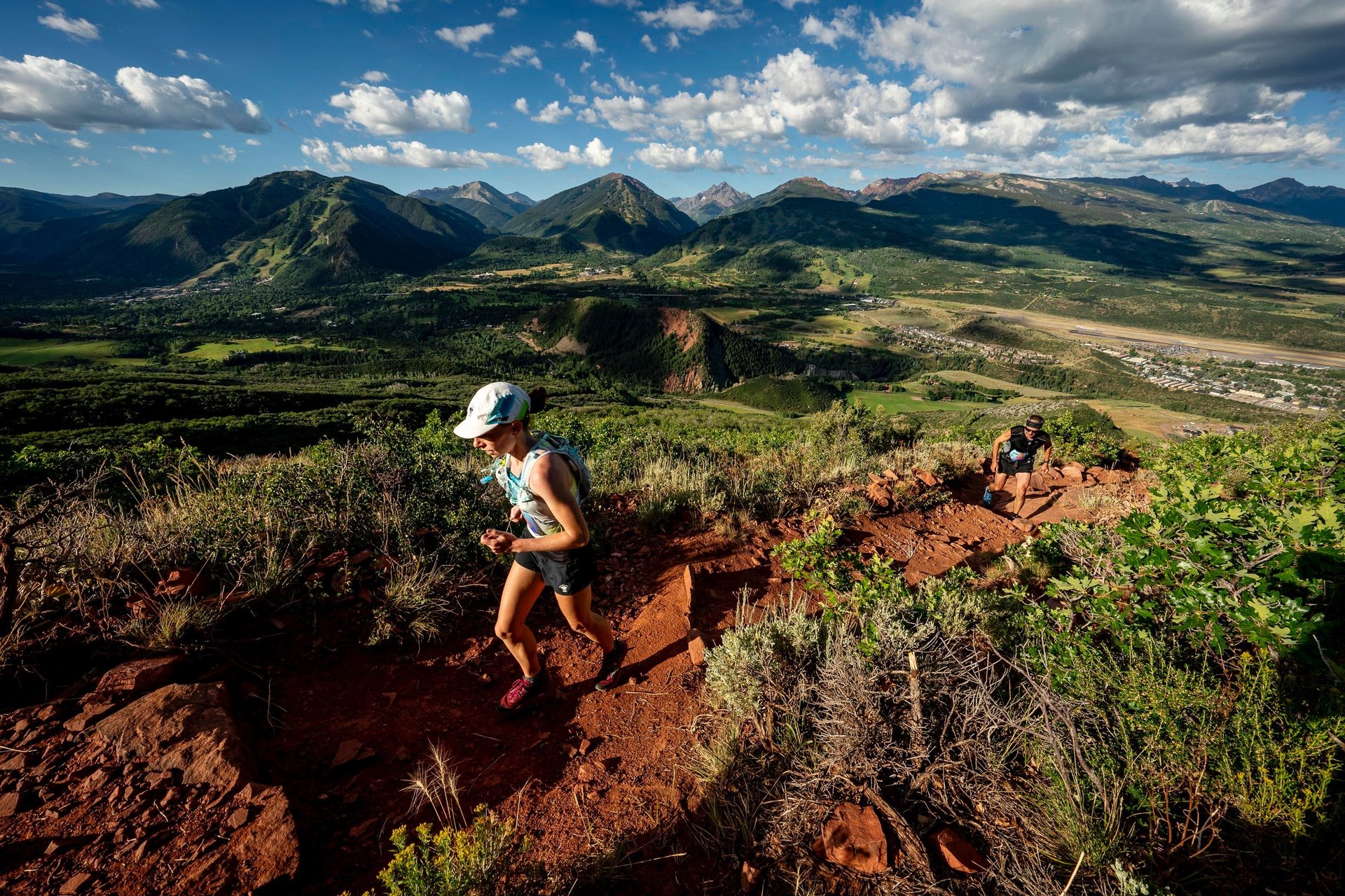an abstract photo of a curved building with a blue sky in the background