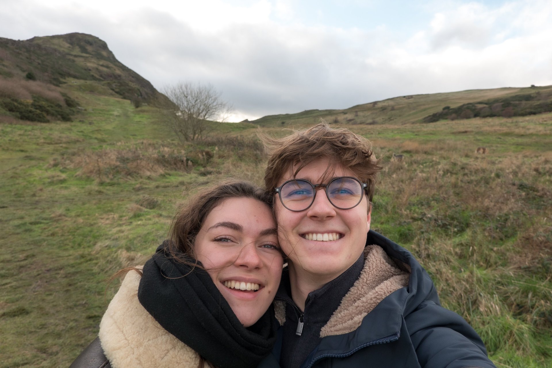 couple wearing silver-colored rings