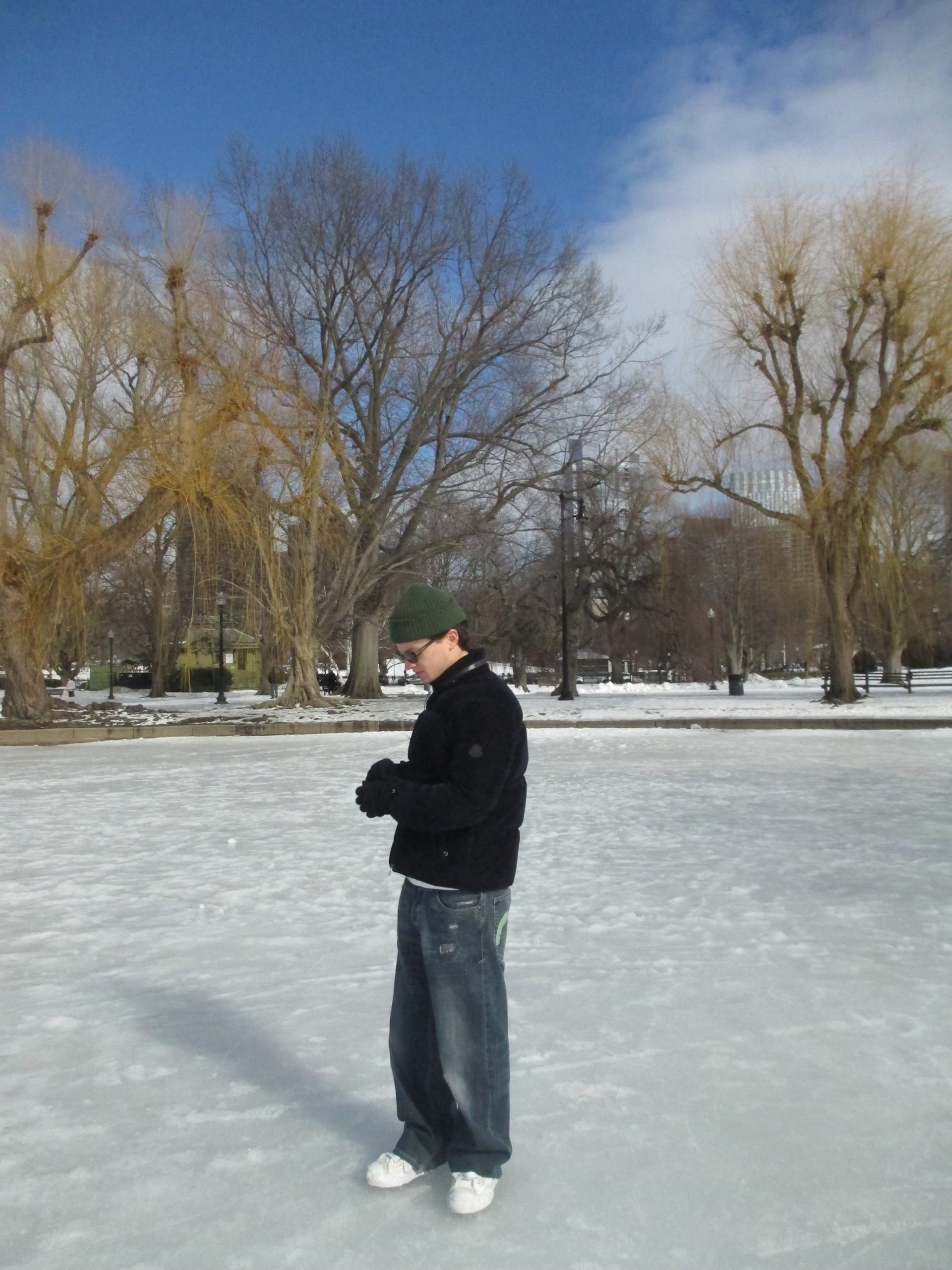person wearing grey knit sweater