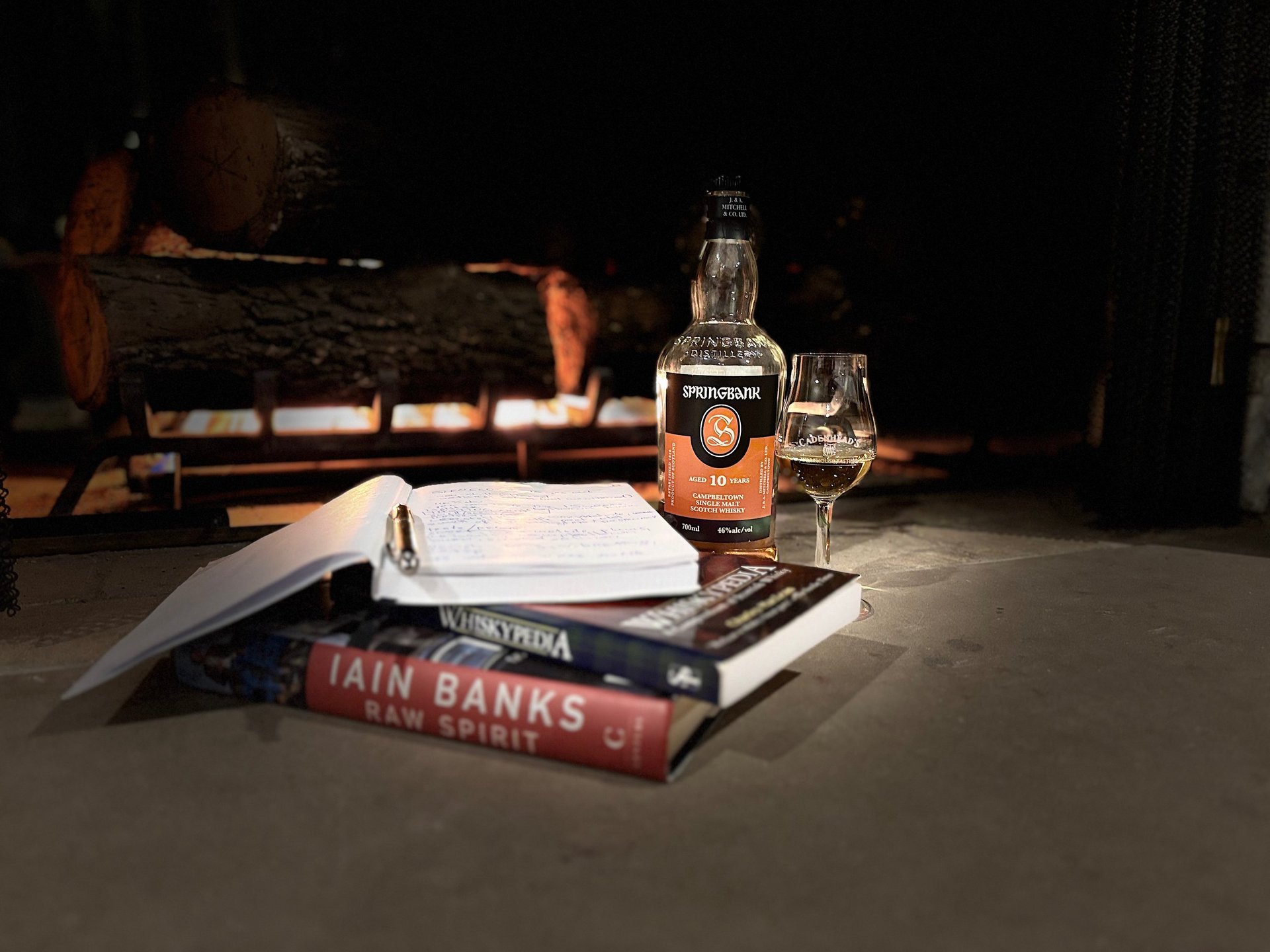 an abstract photo of a curved building with a blue sky in the background