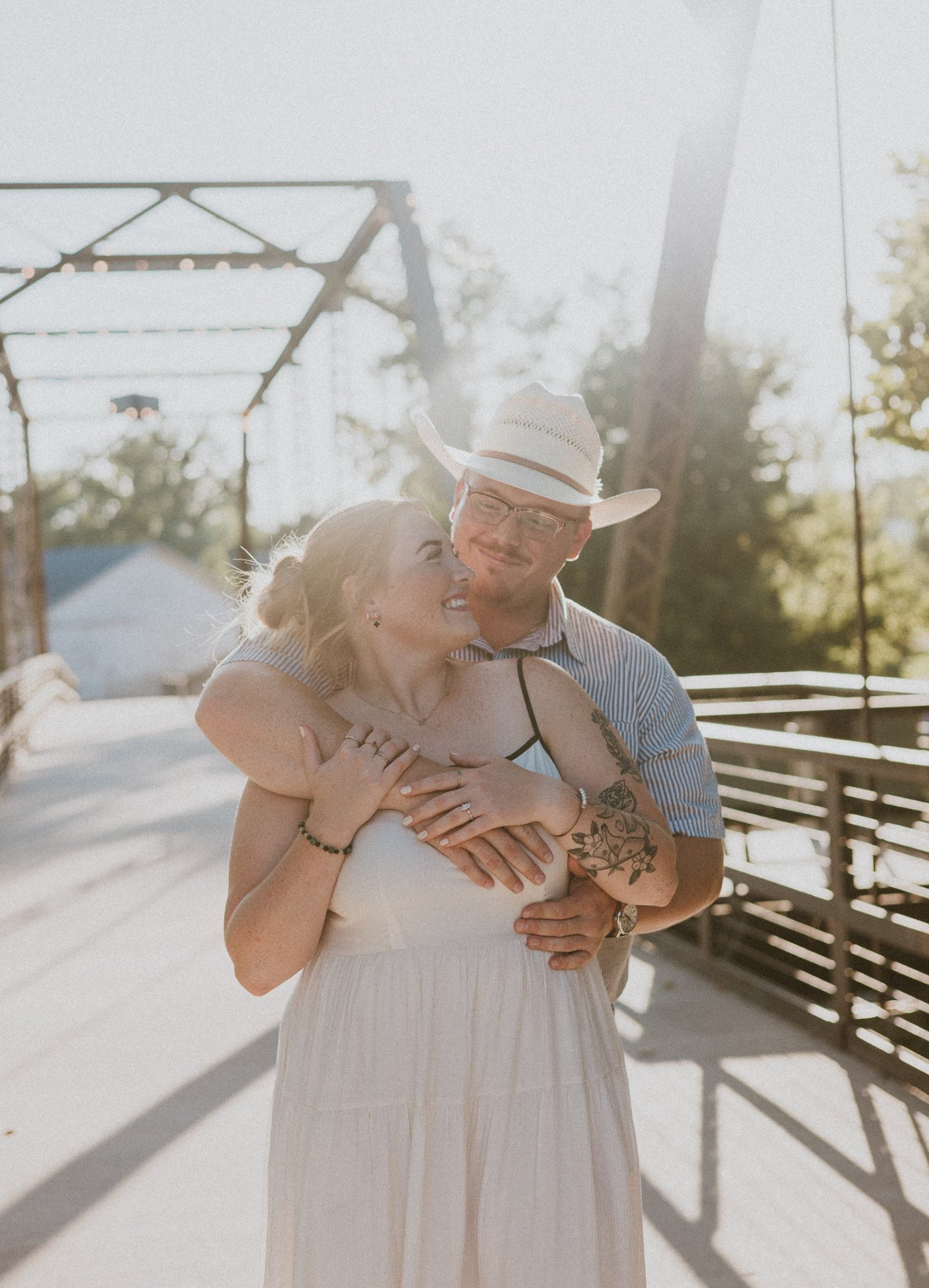 couple wearing silver-colored rings