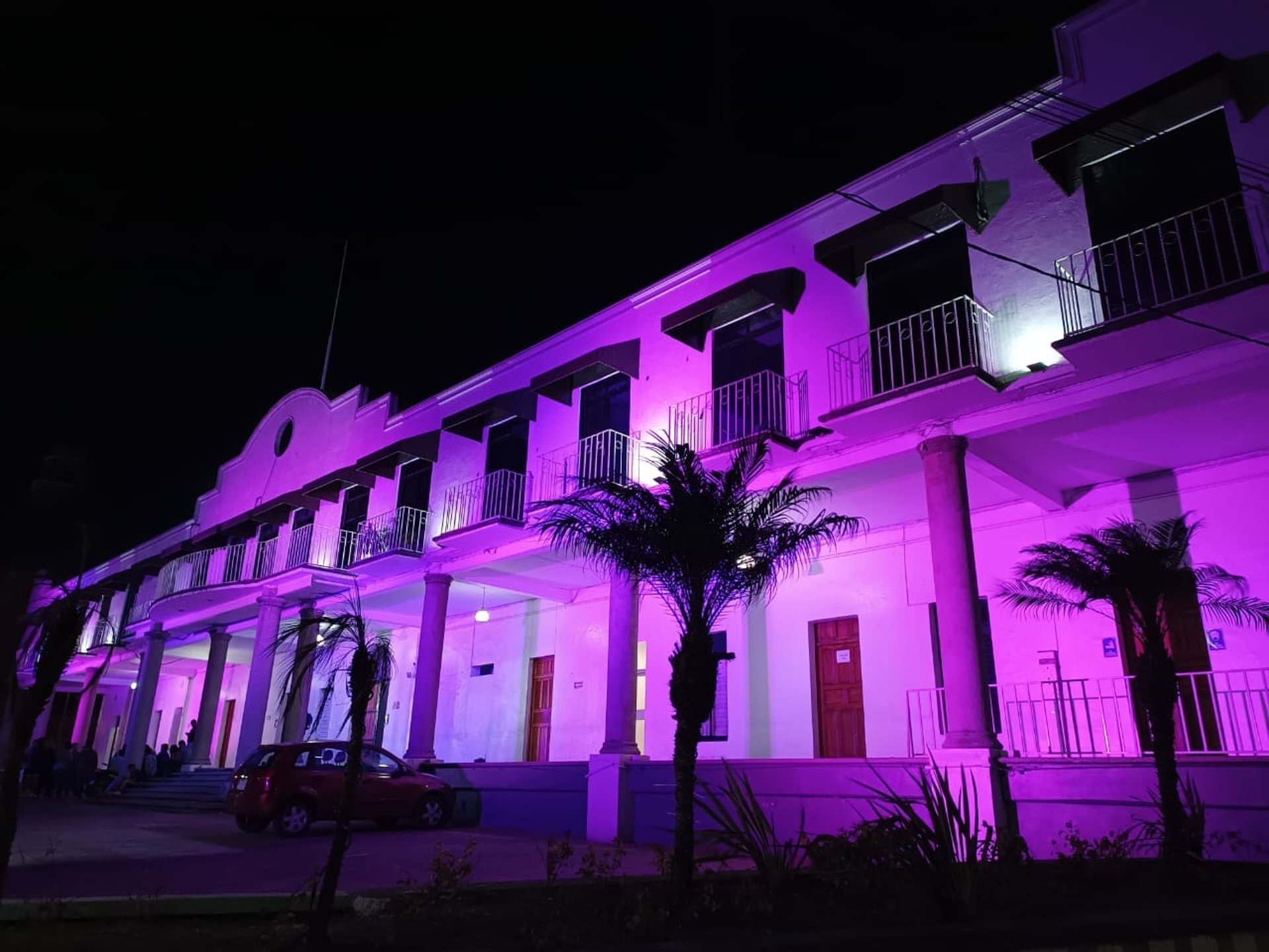 woman wearing yellow long-sleeved dress under white clouds and blue sky during daytime