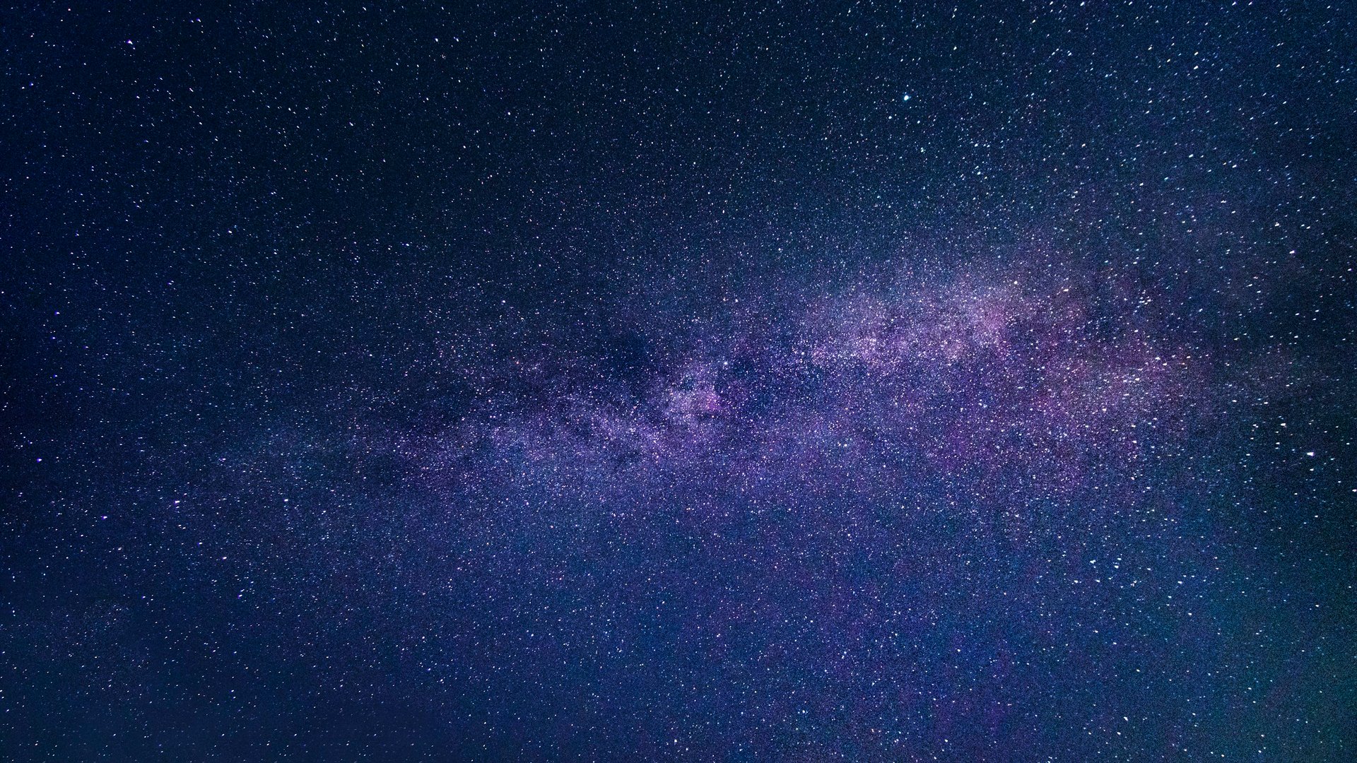 brown concrete building under starry night