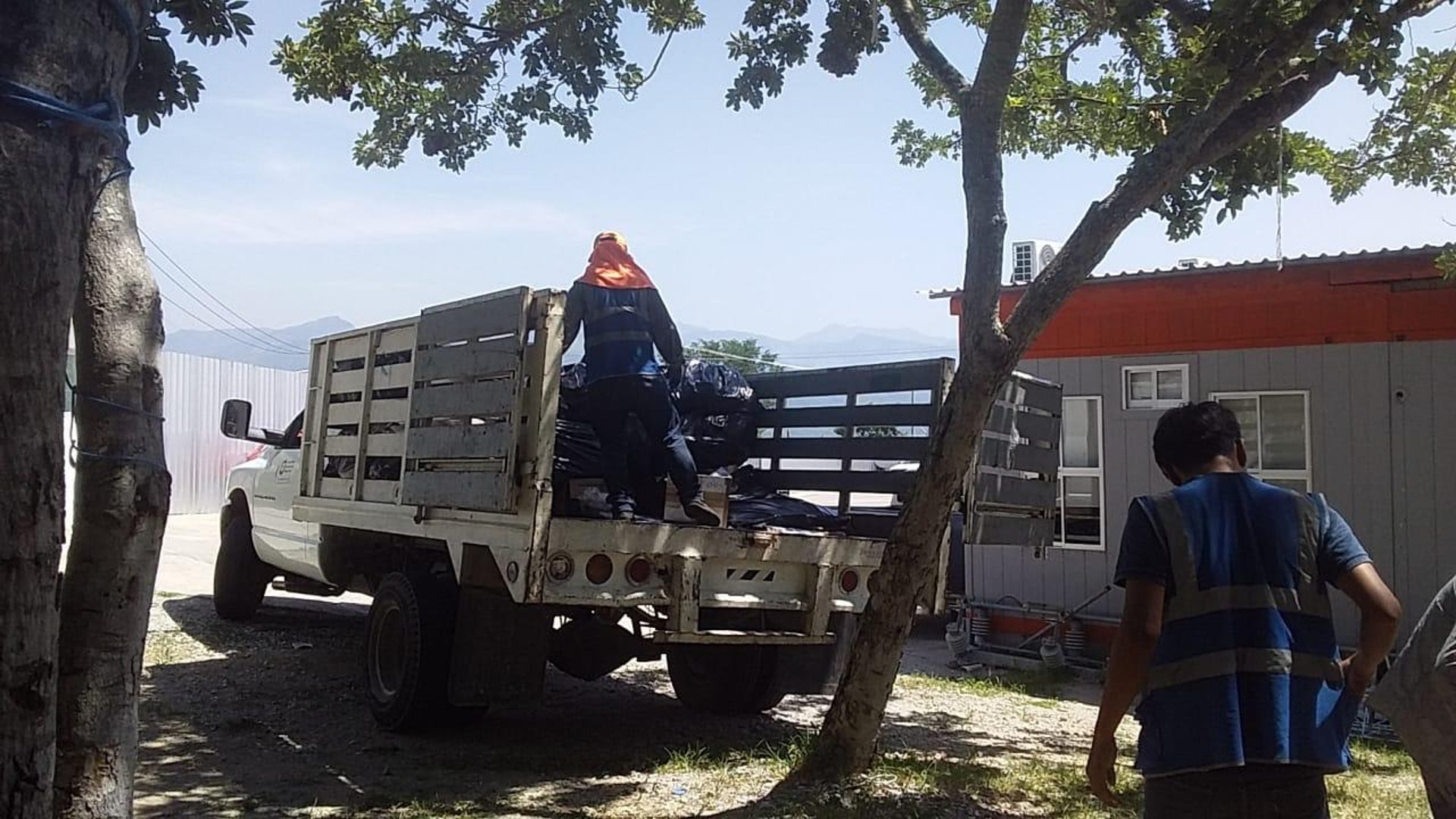 woman wearing yellow long-sleeved dress under white clouds and blue sky during daytime