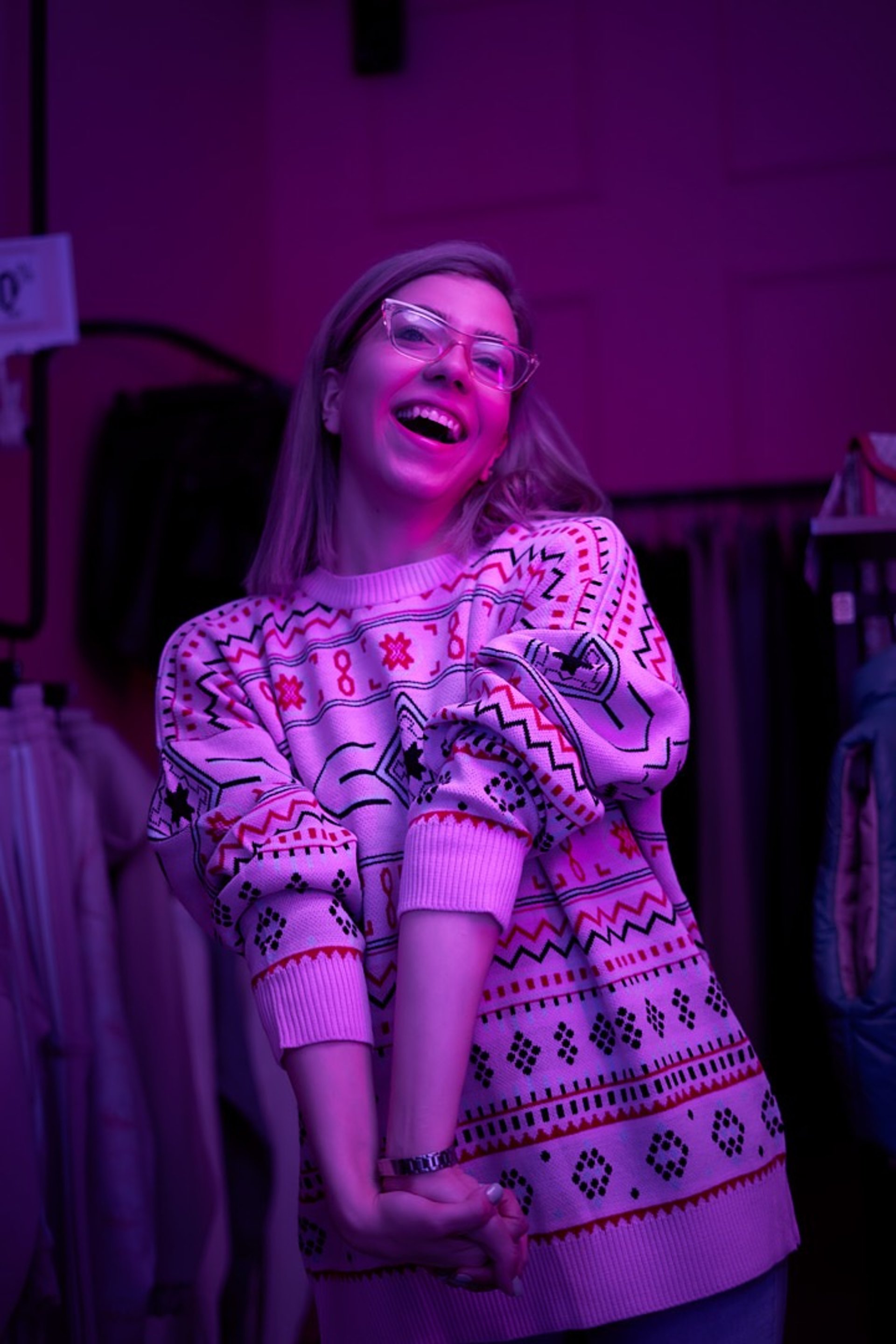 an abstract photo of a curved building with a blue sky in the background