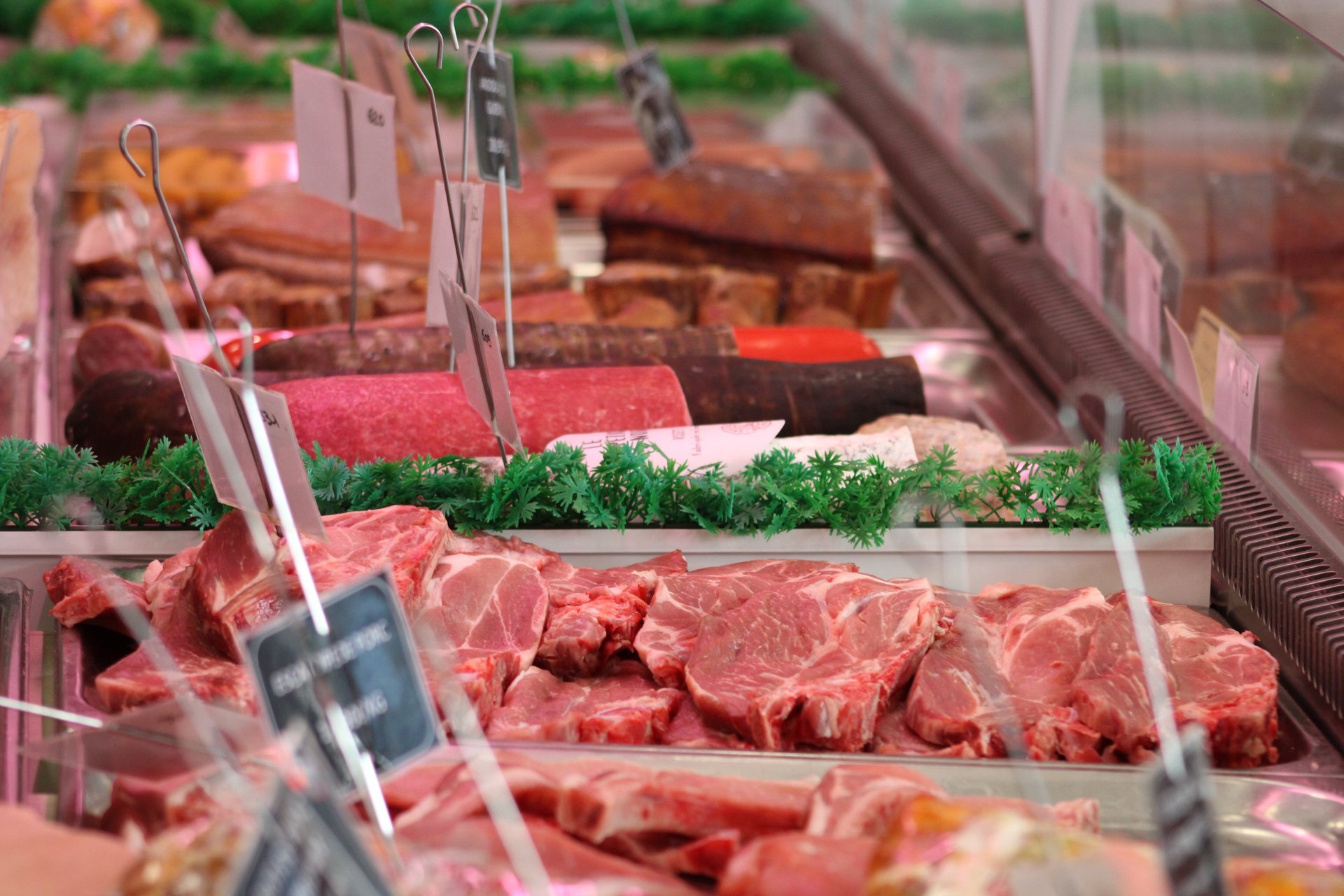 an abstract photo of a curved building with a blue sky in the background