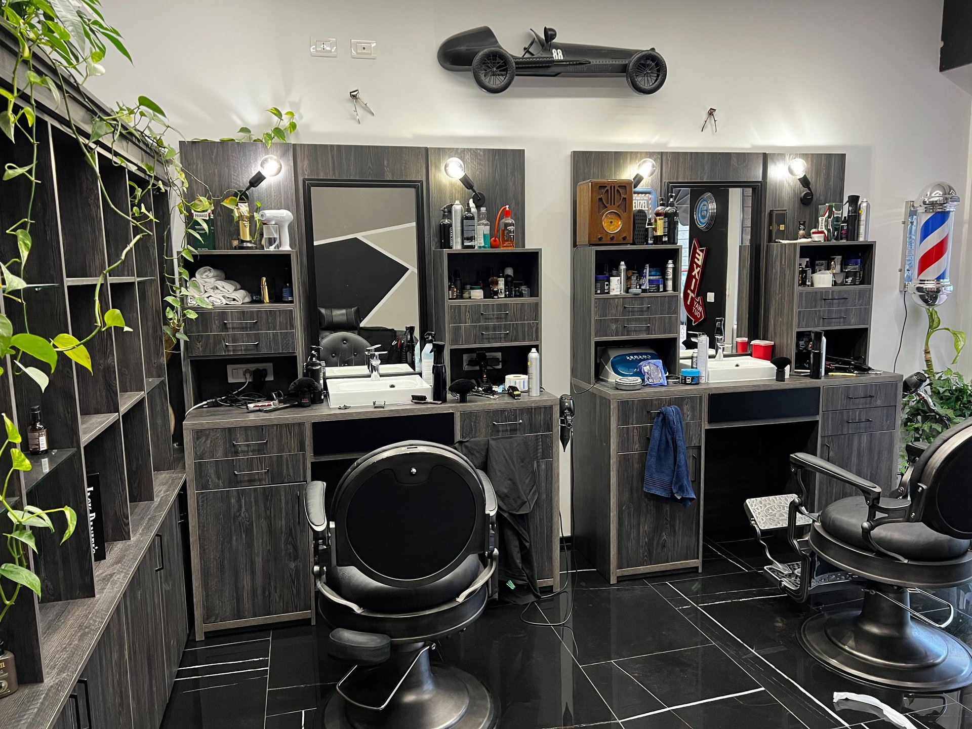 black and brown leather padded tub sofa