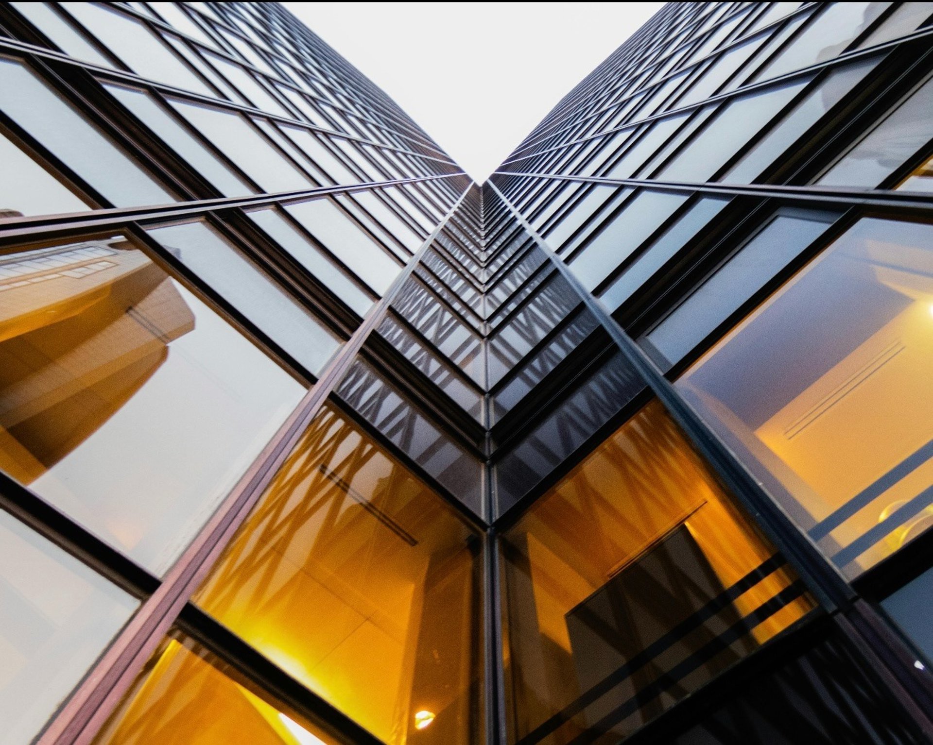 black and brown leather padded tub sofa