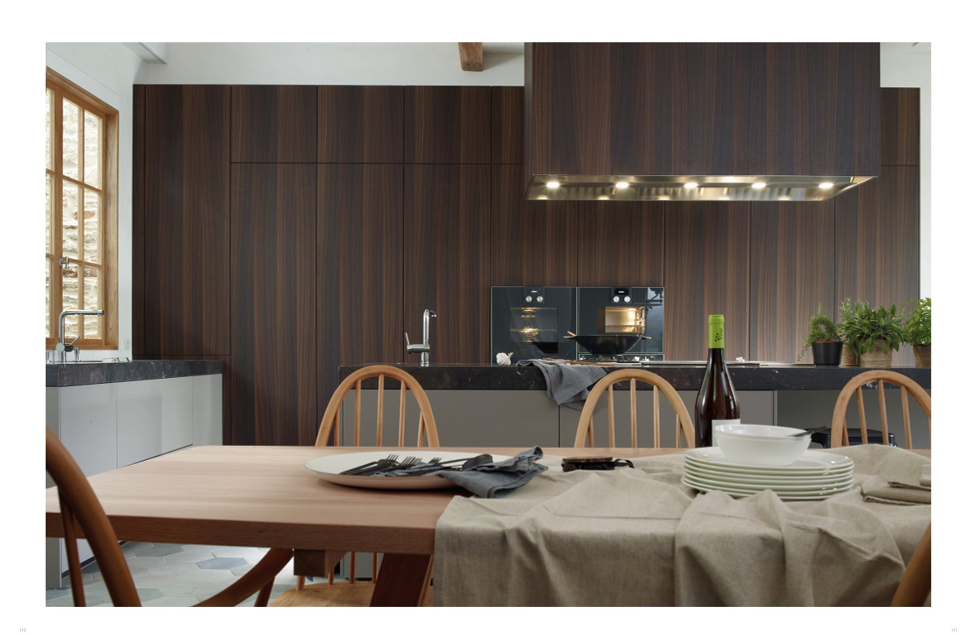 an abstract photo of a curved building with a blue sky in the background