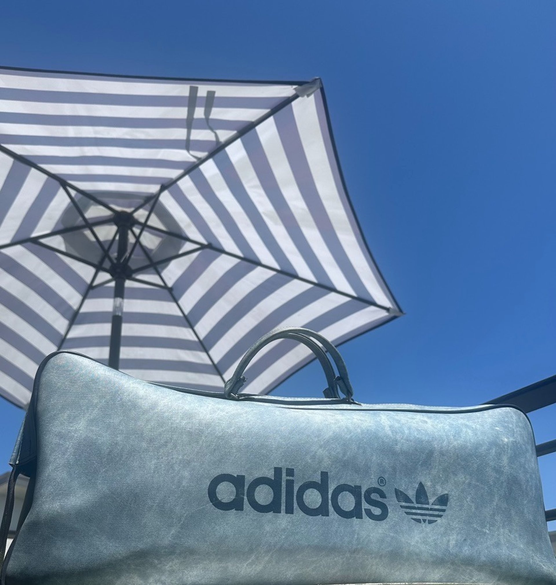 woman wearing yellow long-sleeved dress under white clouds and blue sky during daytime