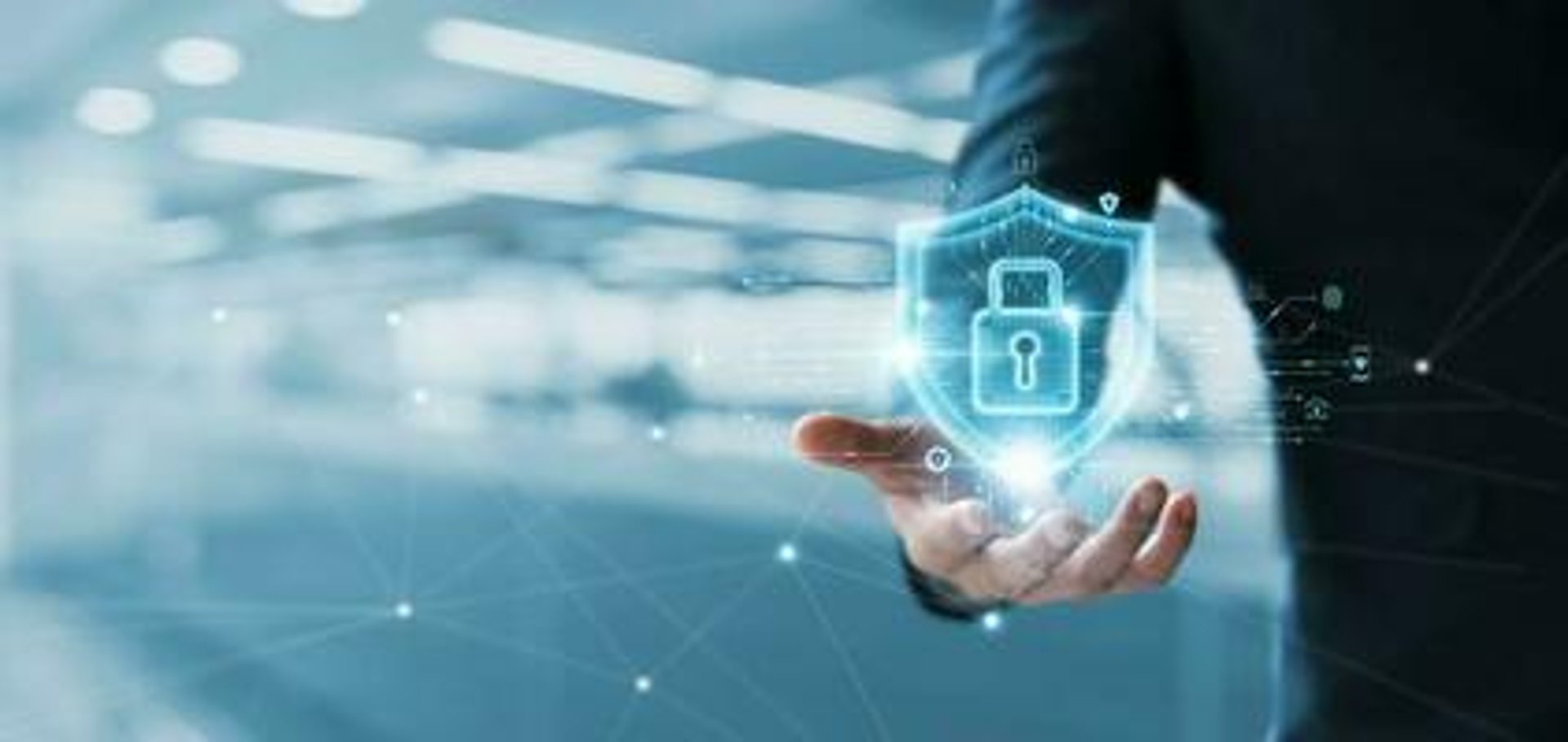 person holding gray and black control panel