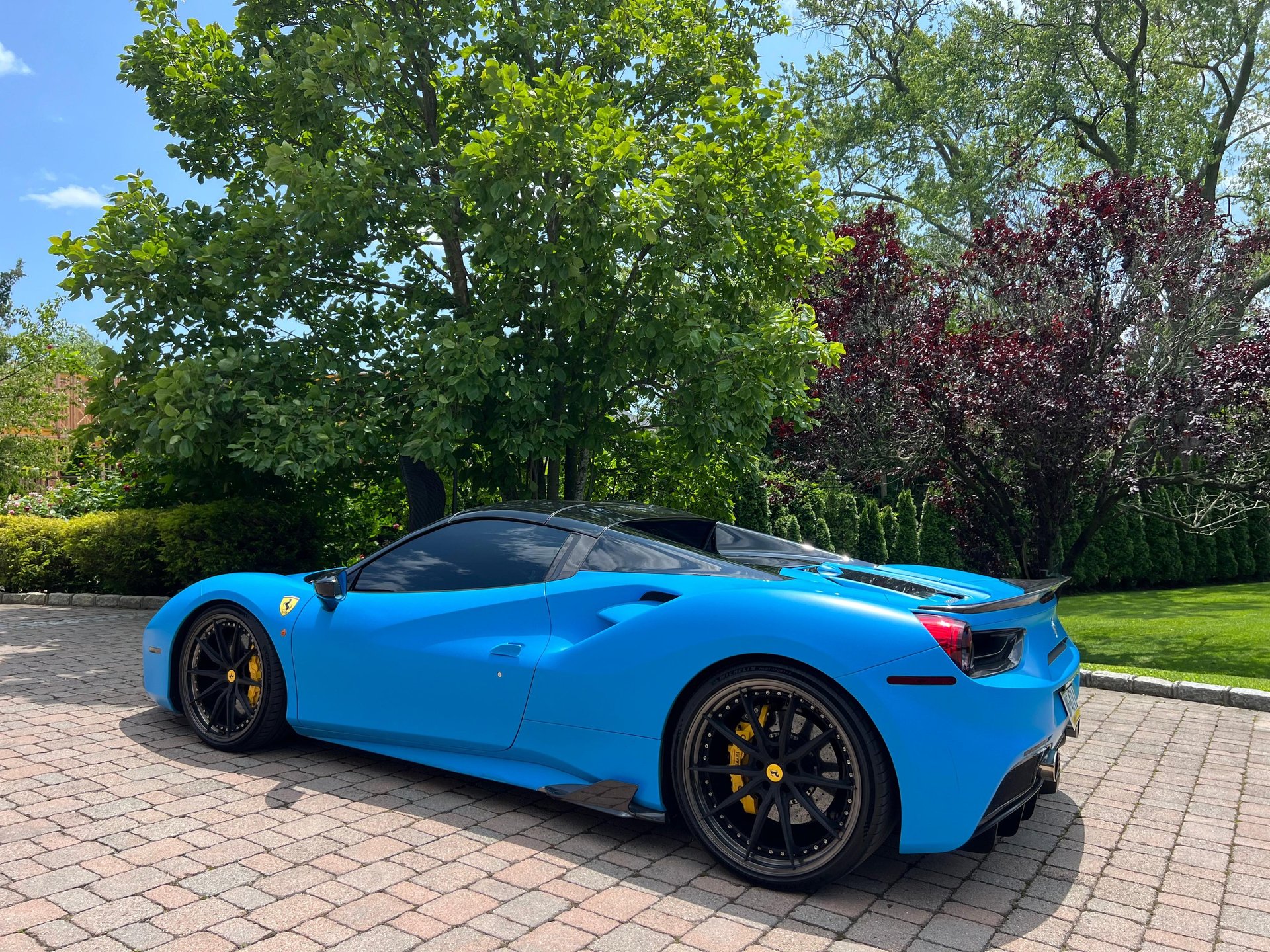 a close up of a wheel on a sports car