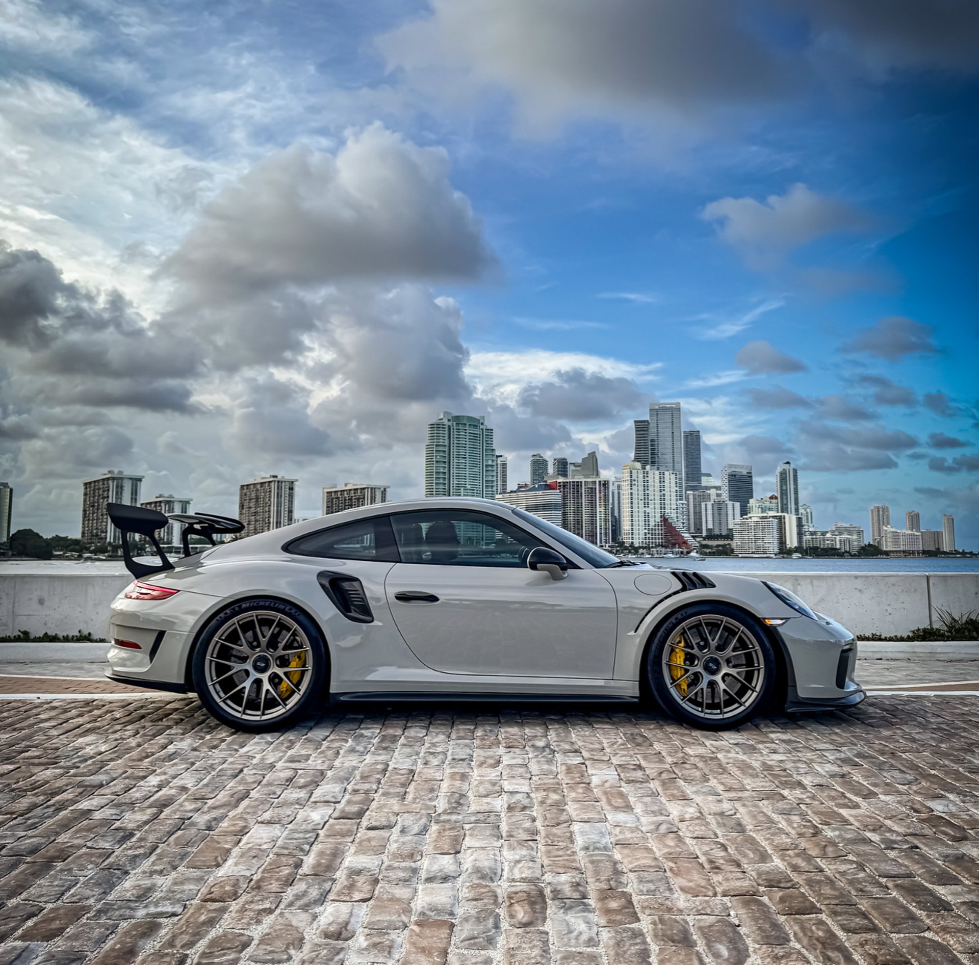a close up of a wheel on a sports car