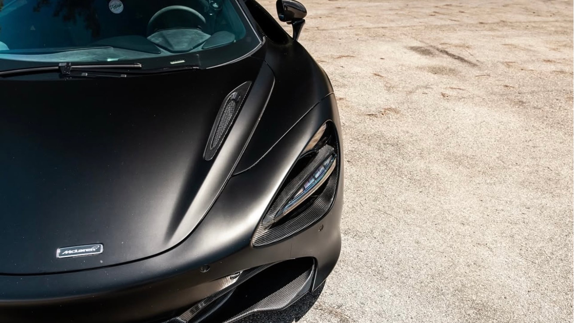 a close up of a wheel on a sports car