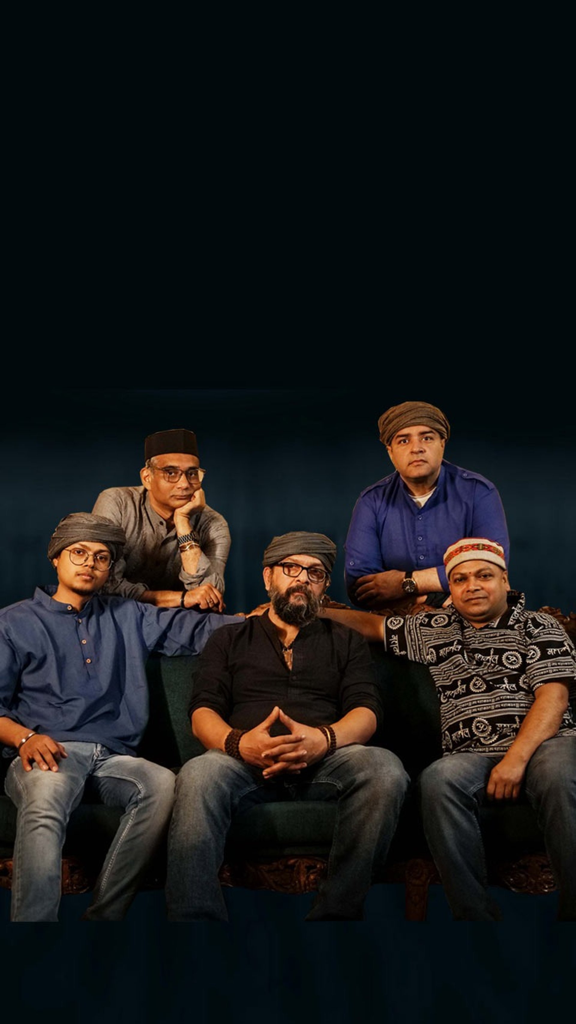 black and brown leather padded tub sofa