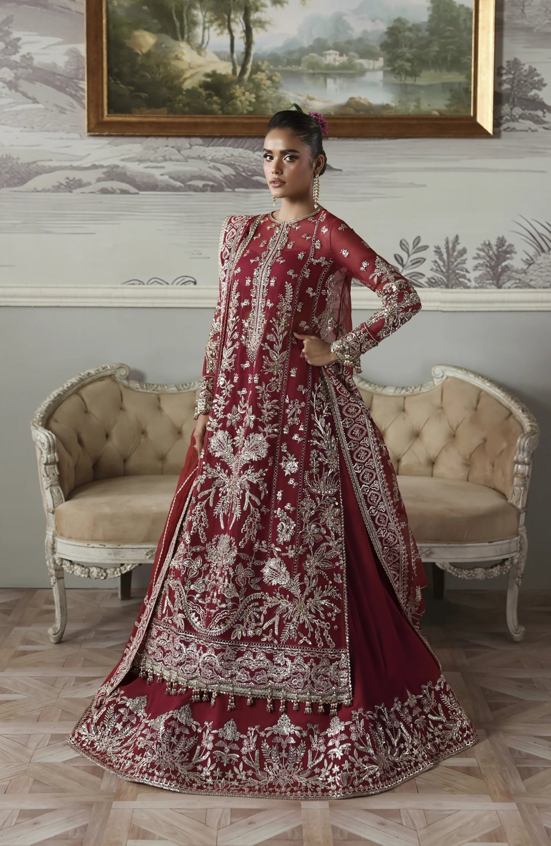 woman wearing yellow long-sleeved dress under white clouds and blue sky during daytime