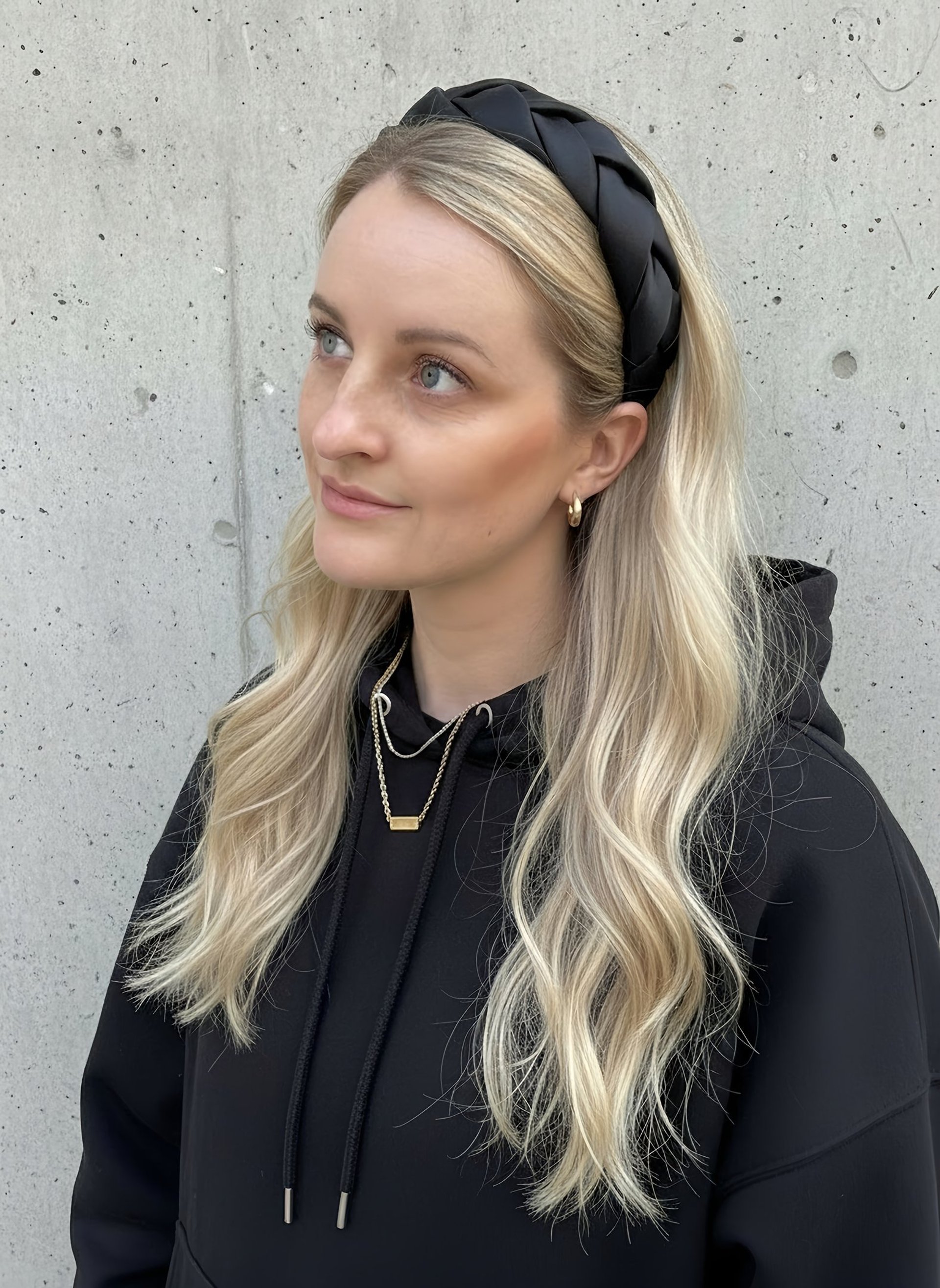 woman in blue and white floral shirt