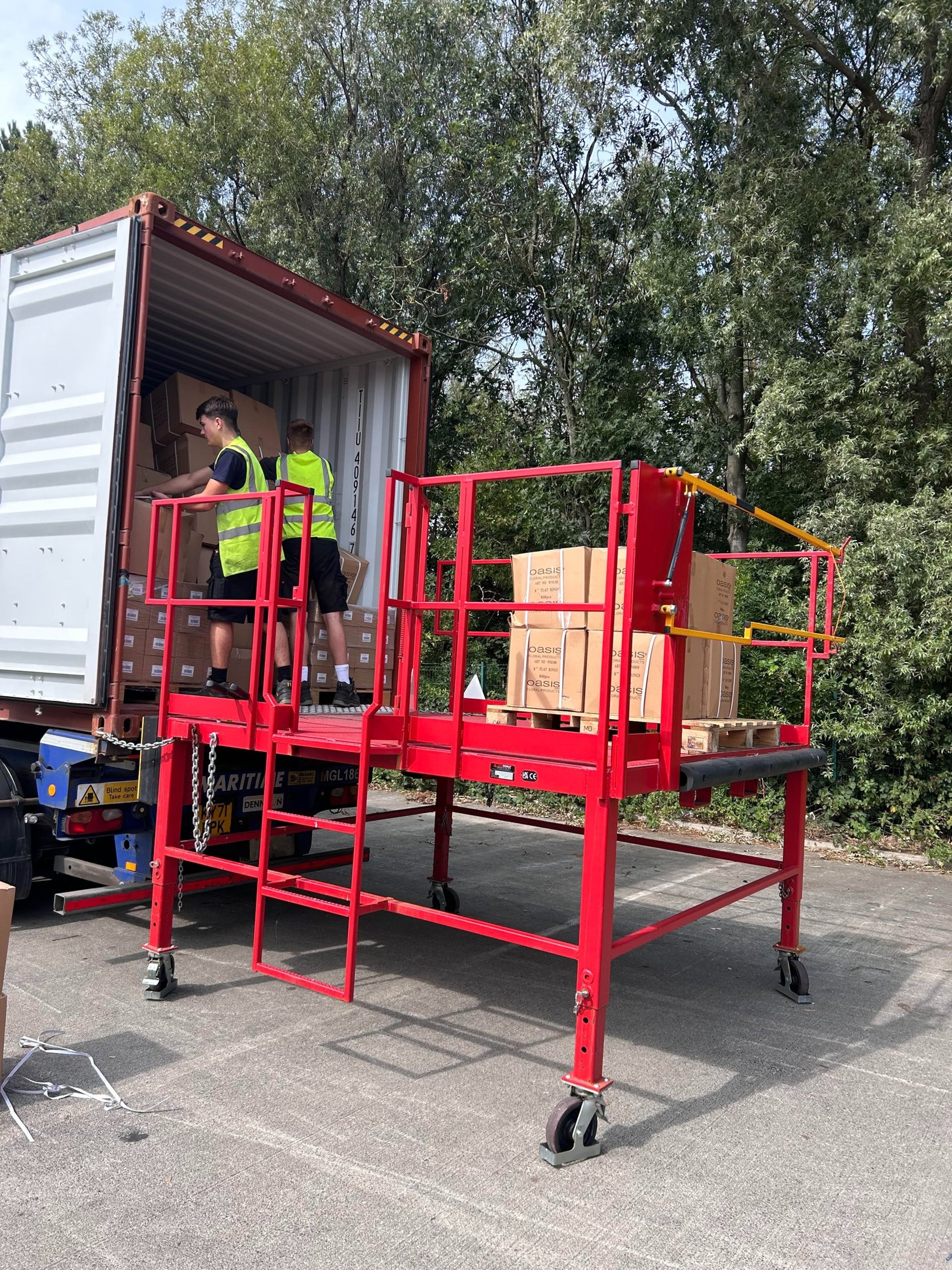 brown wooden shelf with books