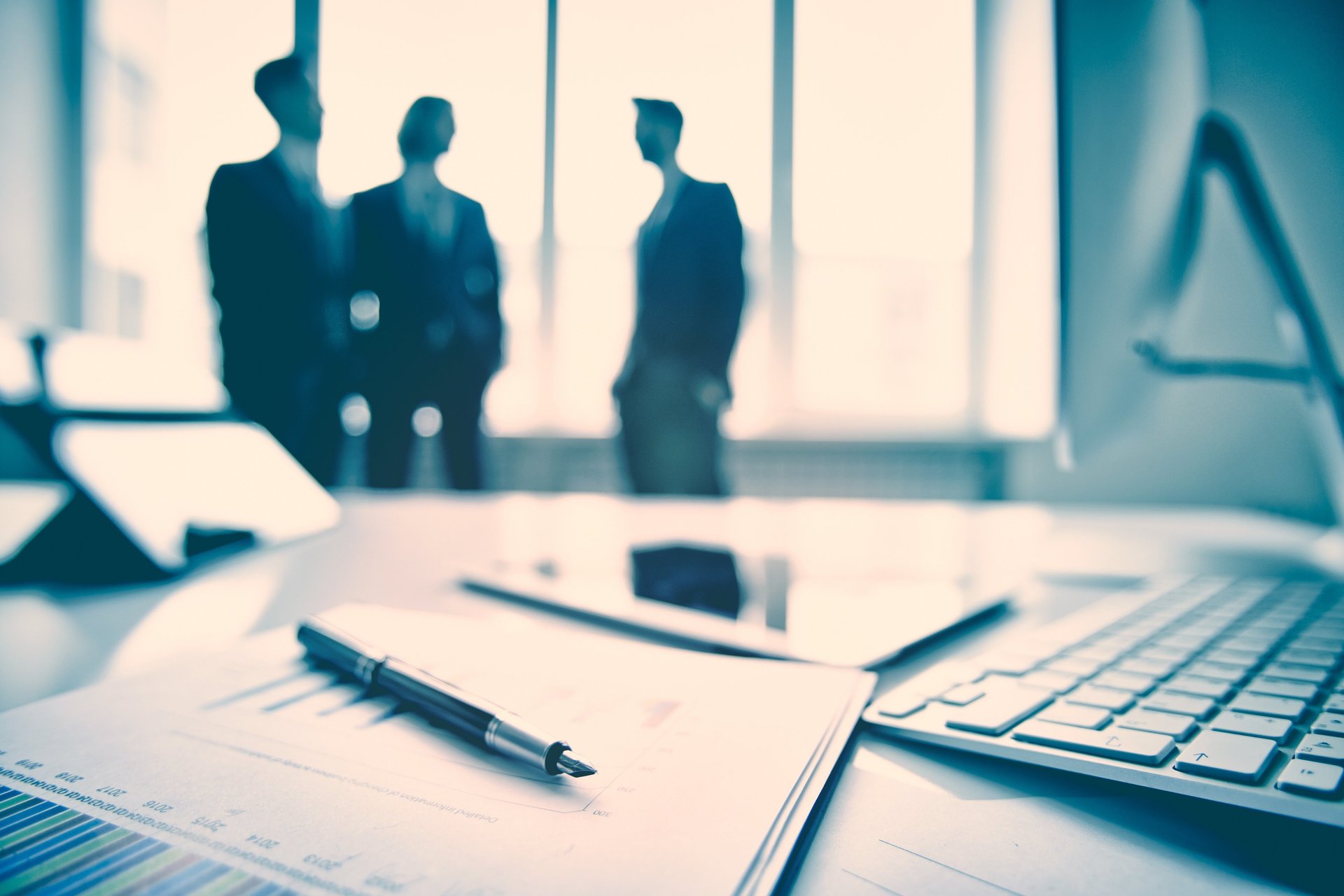 an abstract photo of a curved building with a blue sky in the background