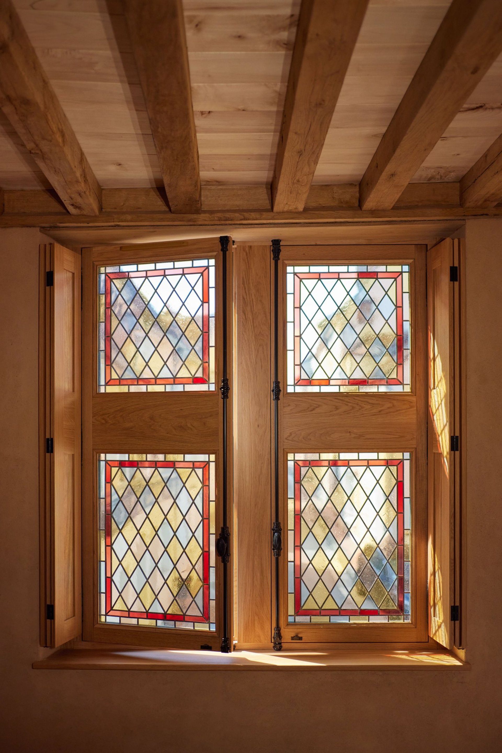an abstract photo of a curved building with a blue sky in the background