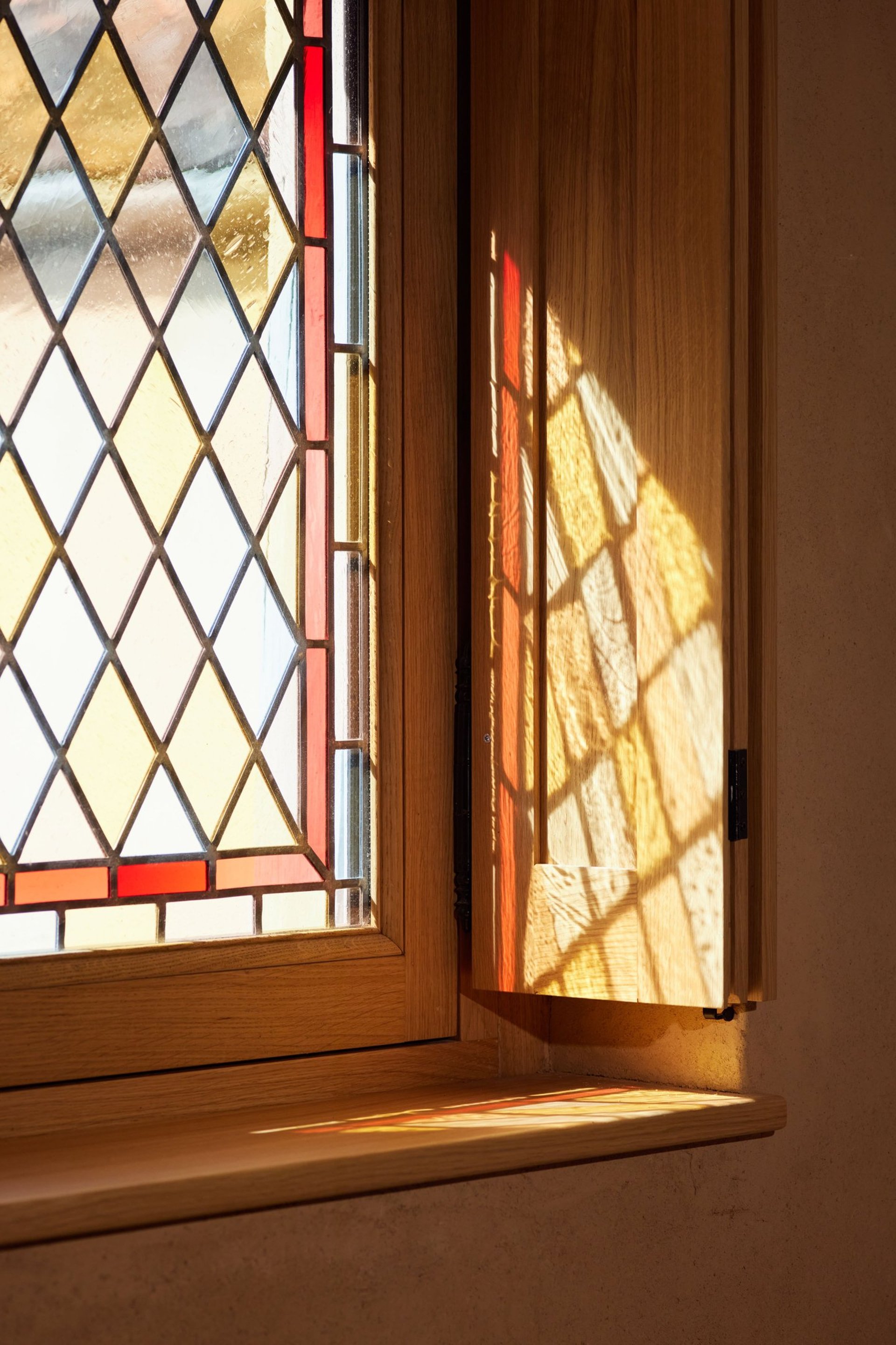 an abstract photo of a curved building with a blue sky in the background