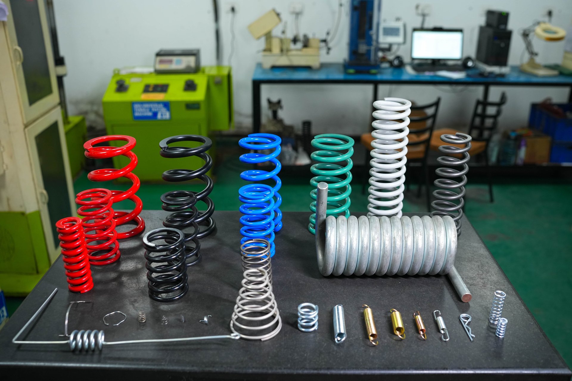 a row of coils on the side of a building