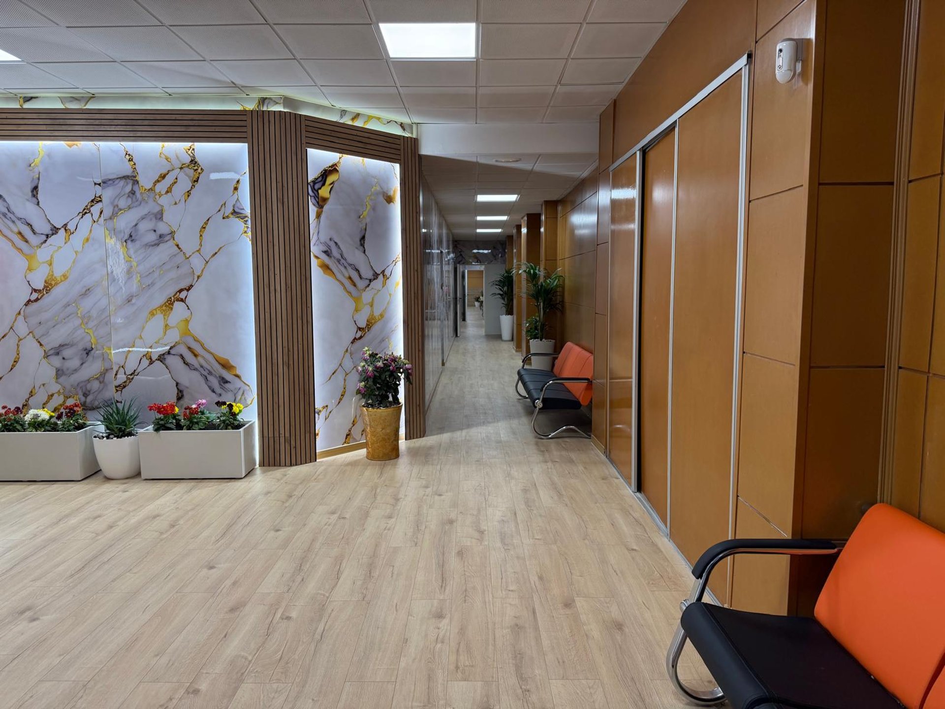 black and brown leather padded tub sofa