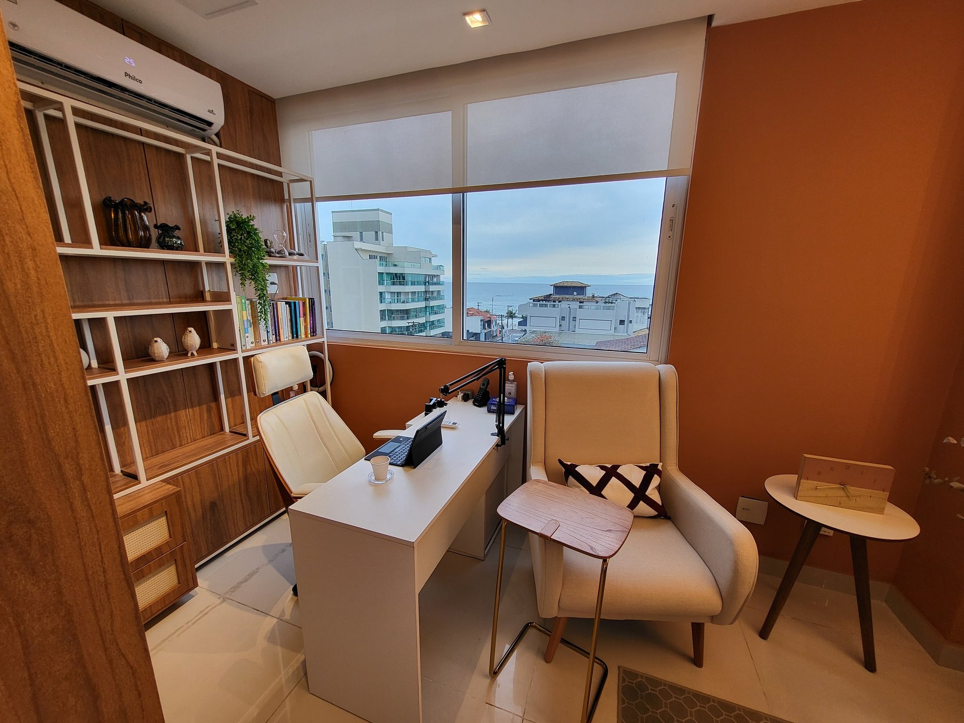 black and brown leather padded tub sofa