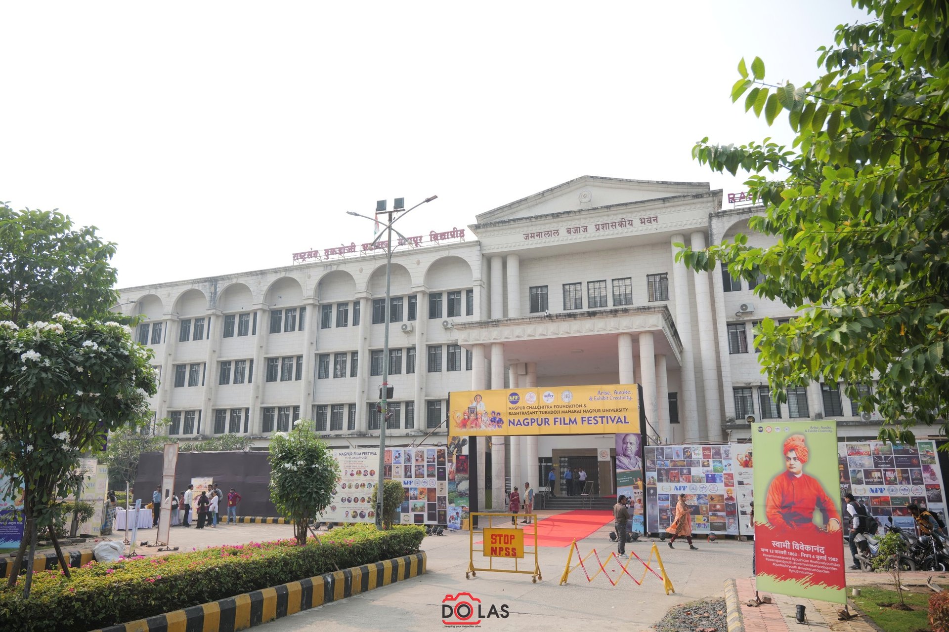 an abstract photo of a curved building with a blue sky in the background