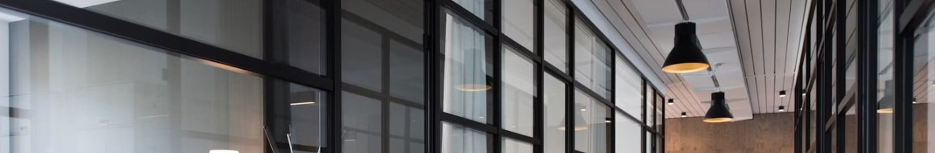 hallway between glass-panel doors
