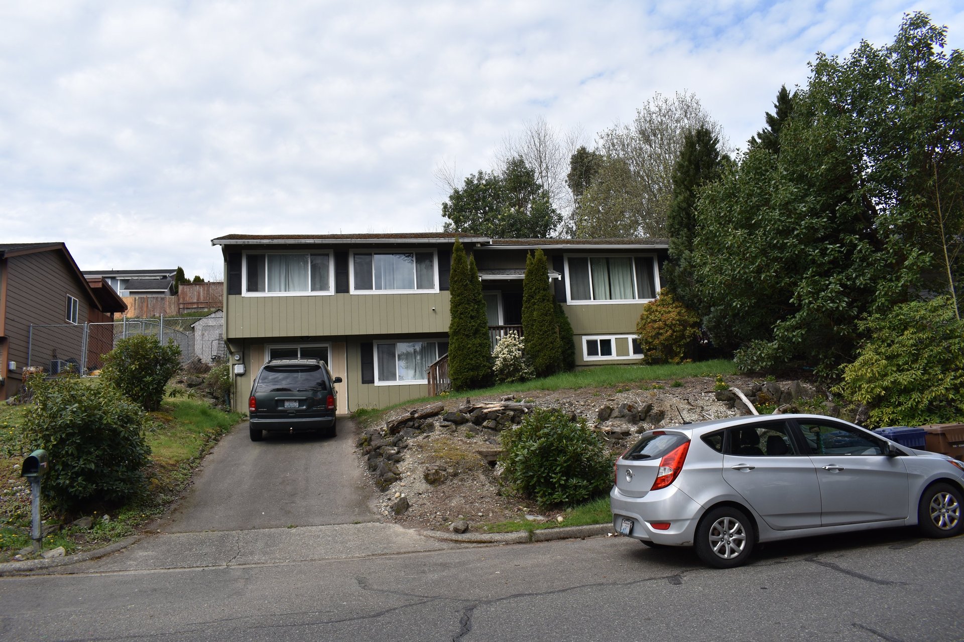 black and brown leather padded tub sofa