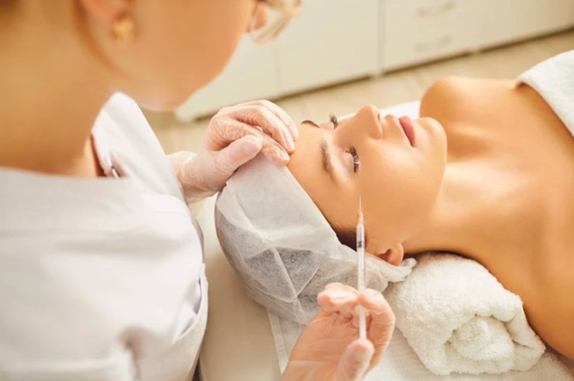 woman wearing yellow long-sleeved dress under white clouds and blue sky during daytime