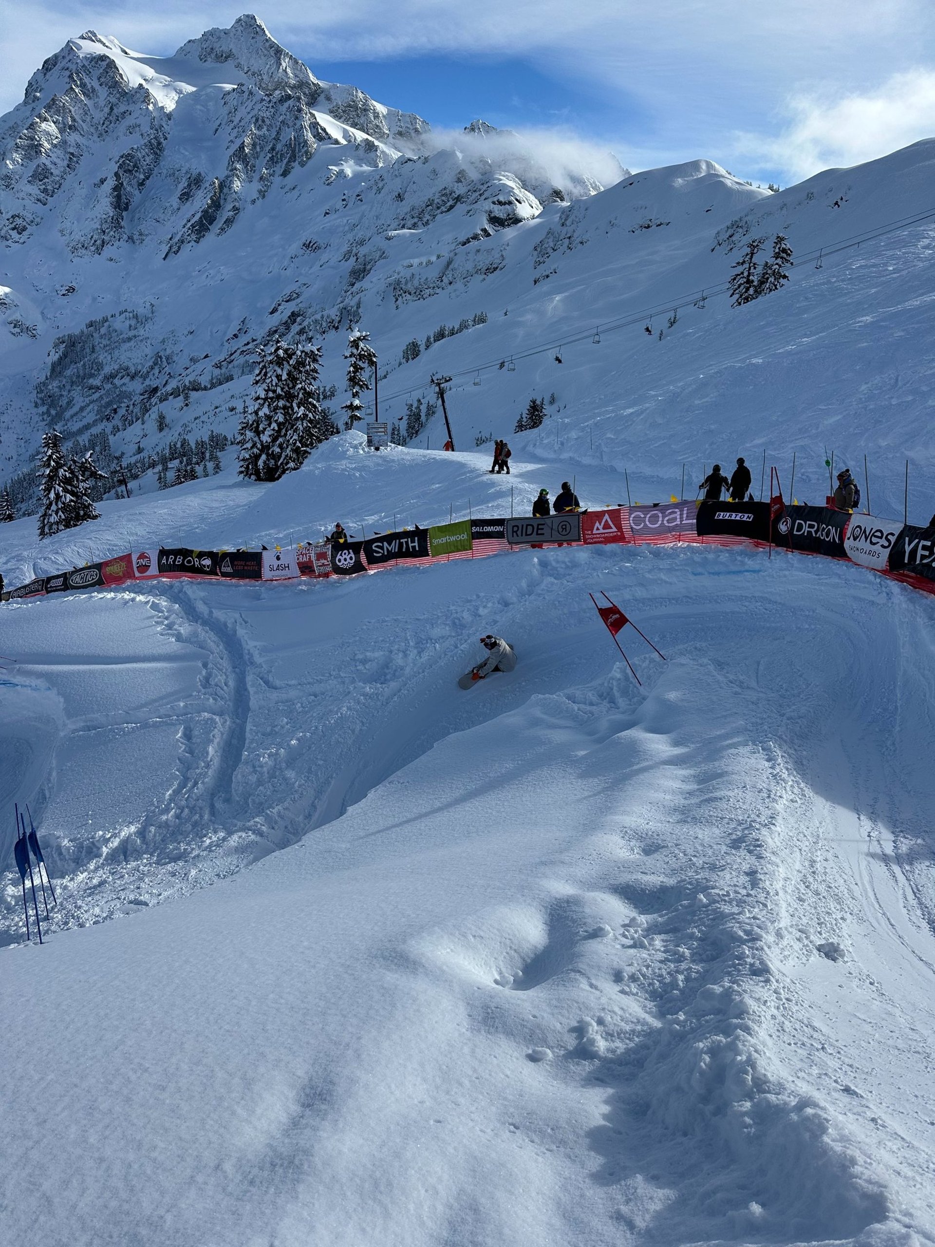 a person skiing down a snow covered mountain