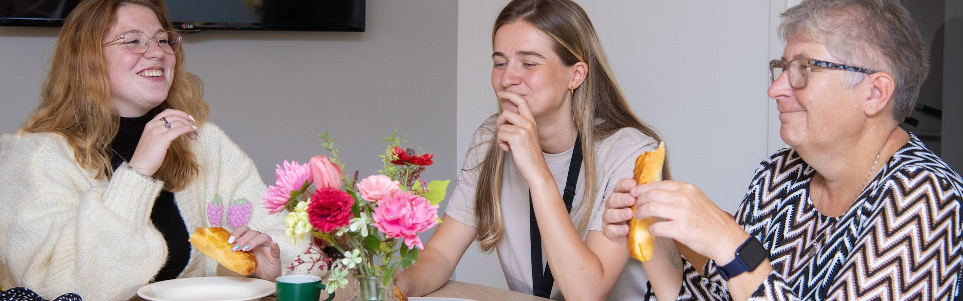 assorted-color buildings beside body of water