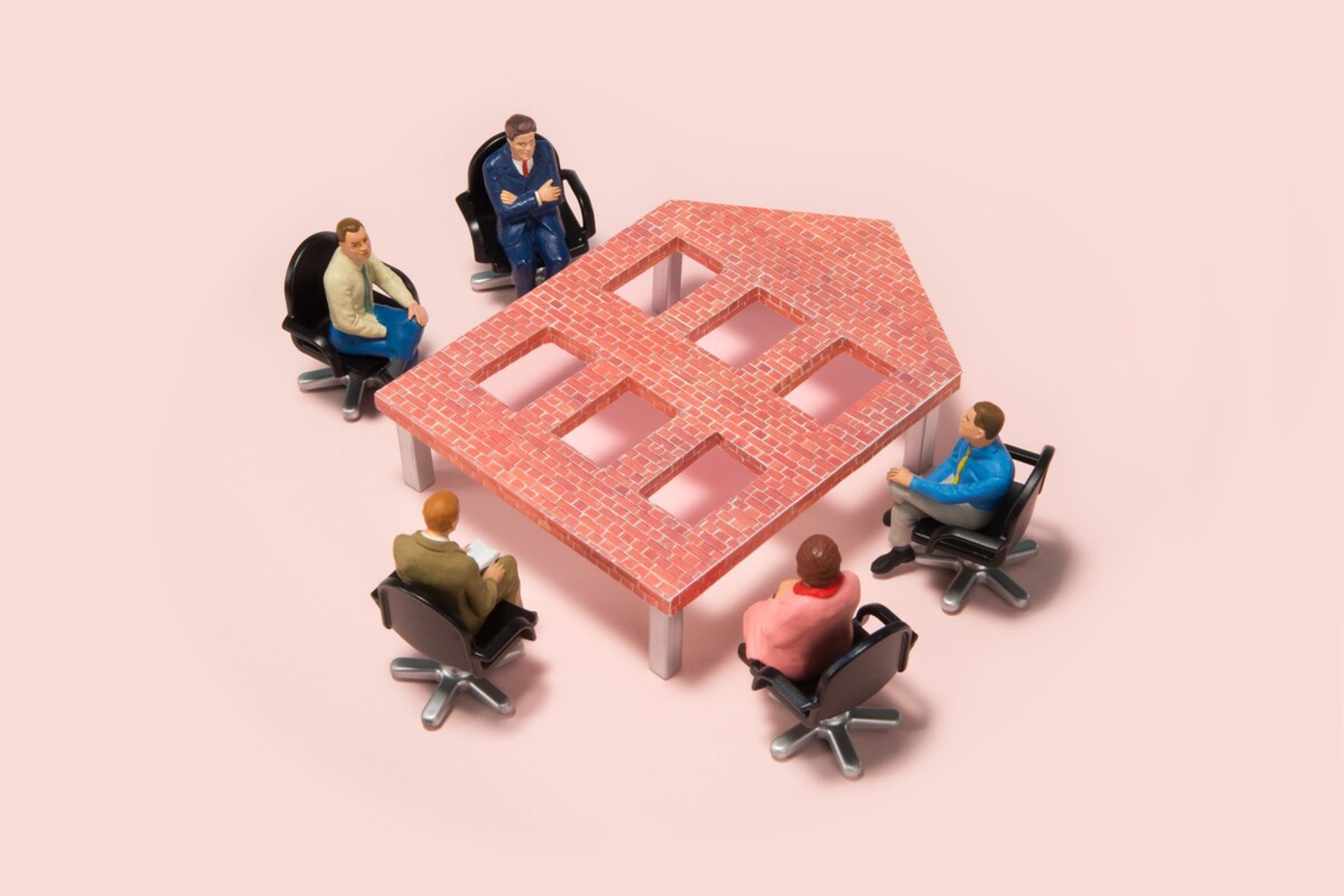 two person holding papercut heart