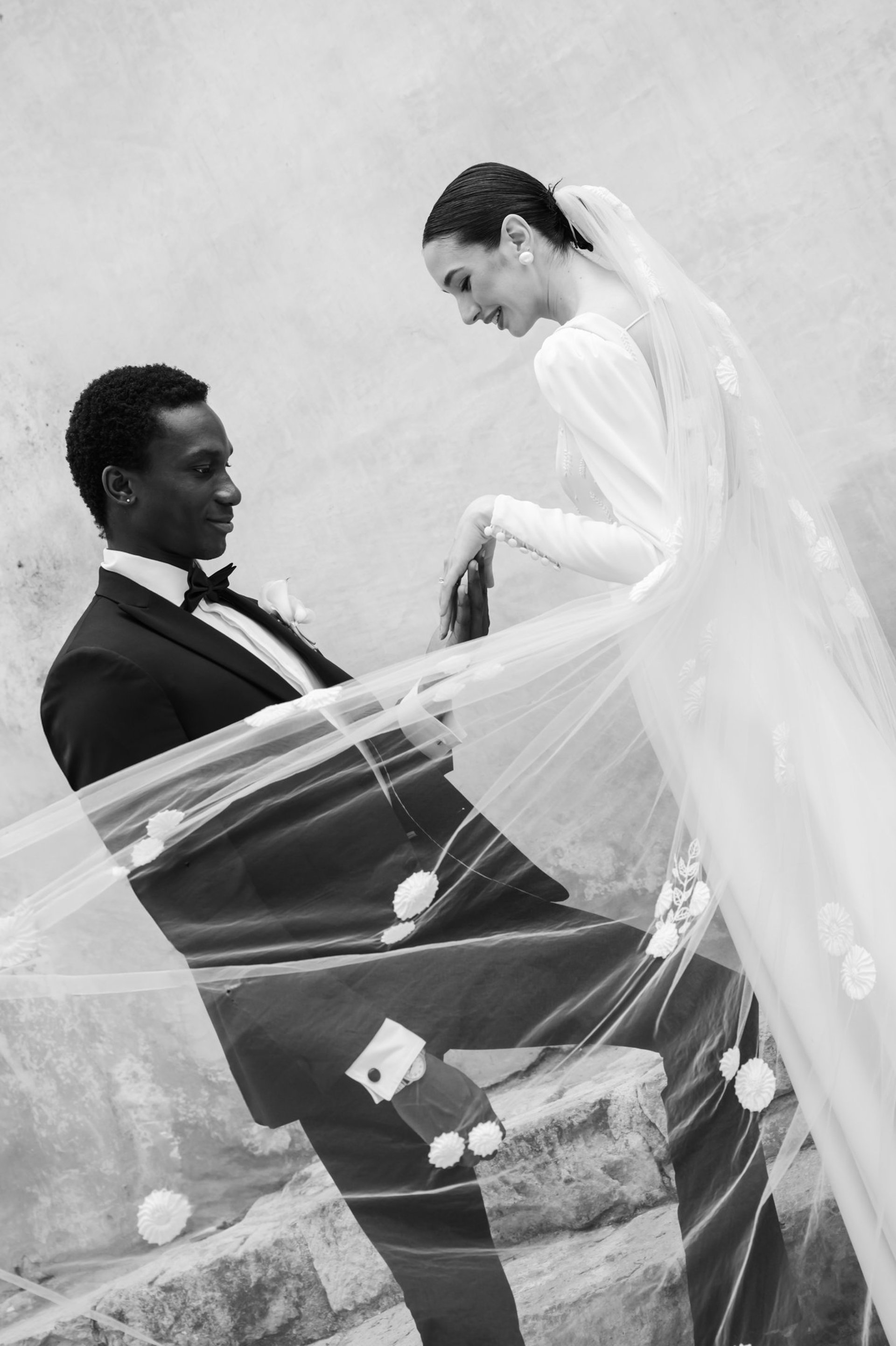 an abstract photo of a curved building with a blue sky in the background