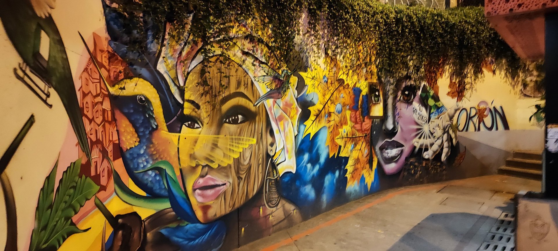 woman wearing yellow long-sleeved dress under white clouds and blue sky during daytime