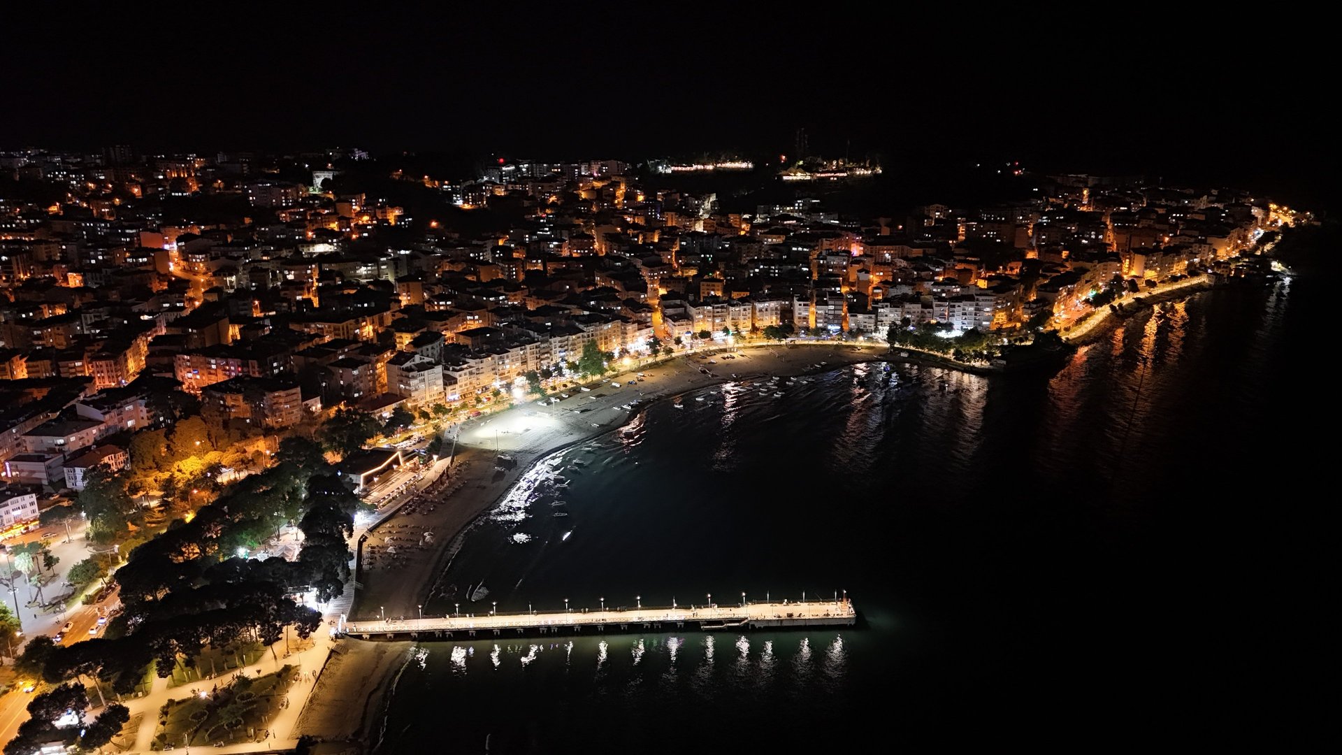 an abstract photo of a curved building with a blue sky in the background