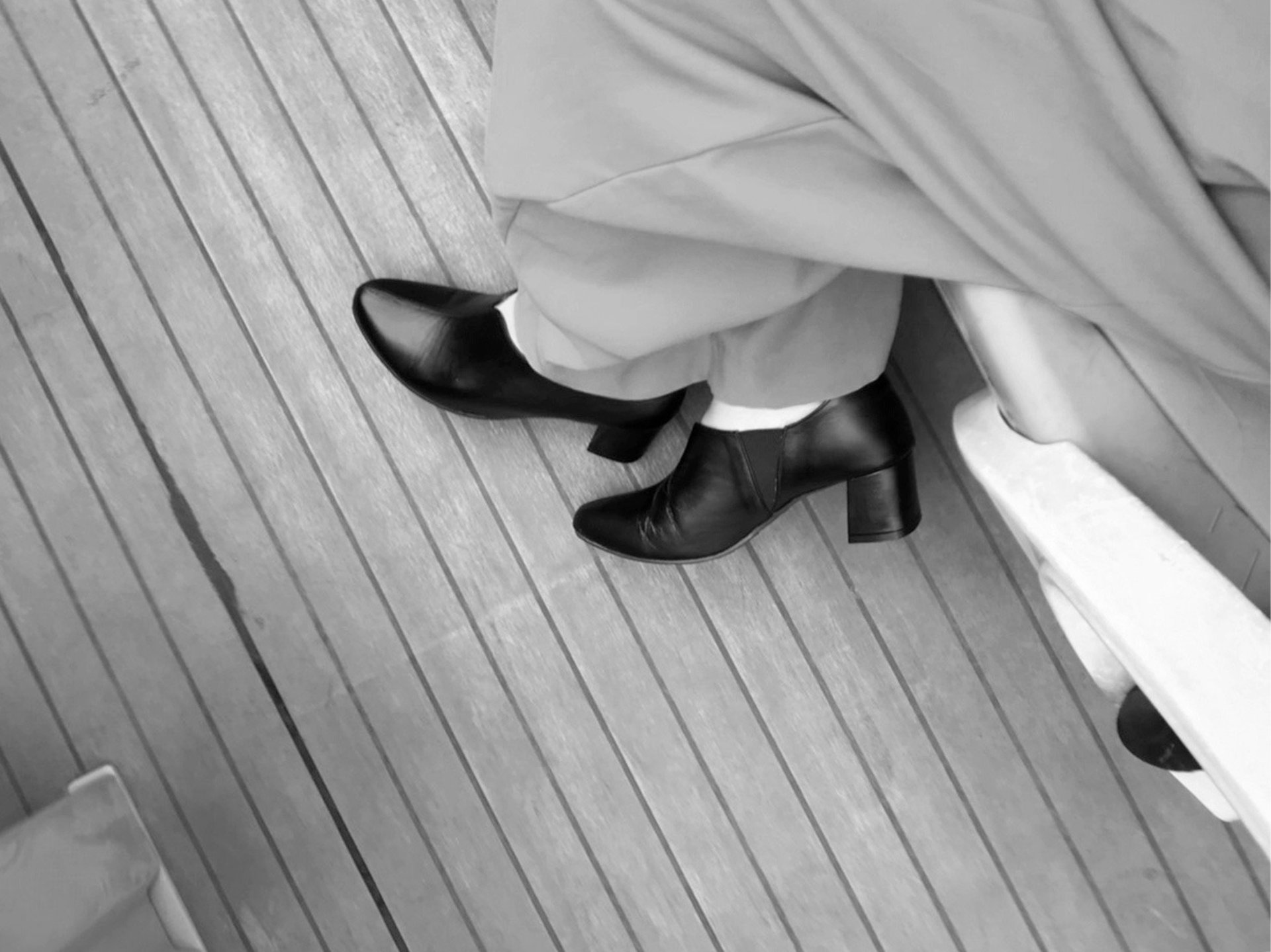 woman wearing yellow long-sleeved dress under white clouds and blue sky during daytime