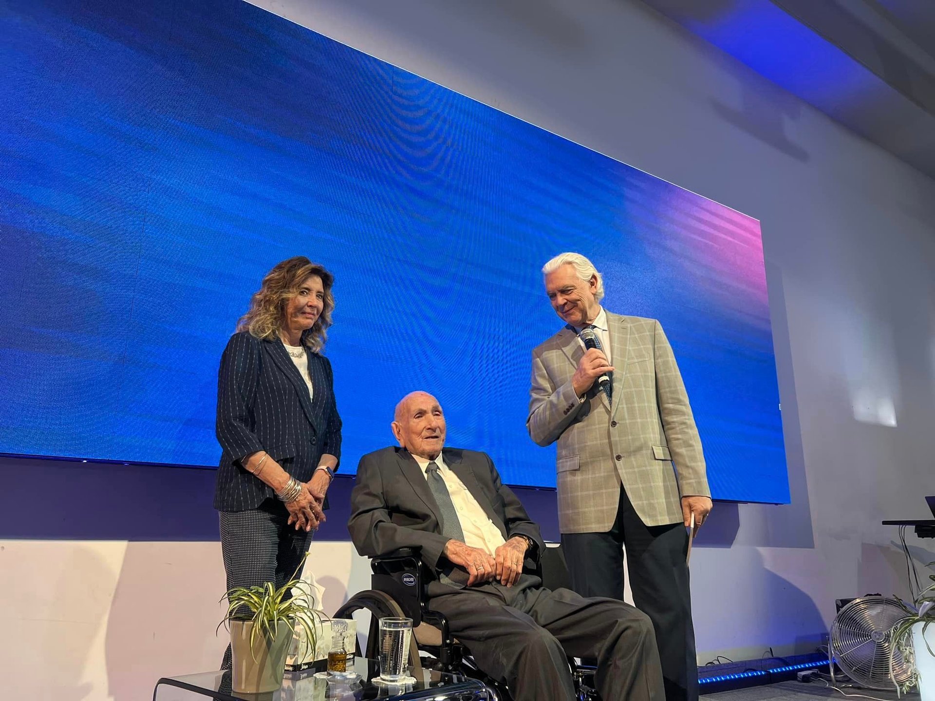woman wearing yellow long-sleeved dress under white clouds and blue sky during daytime