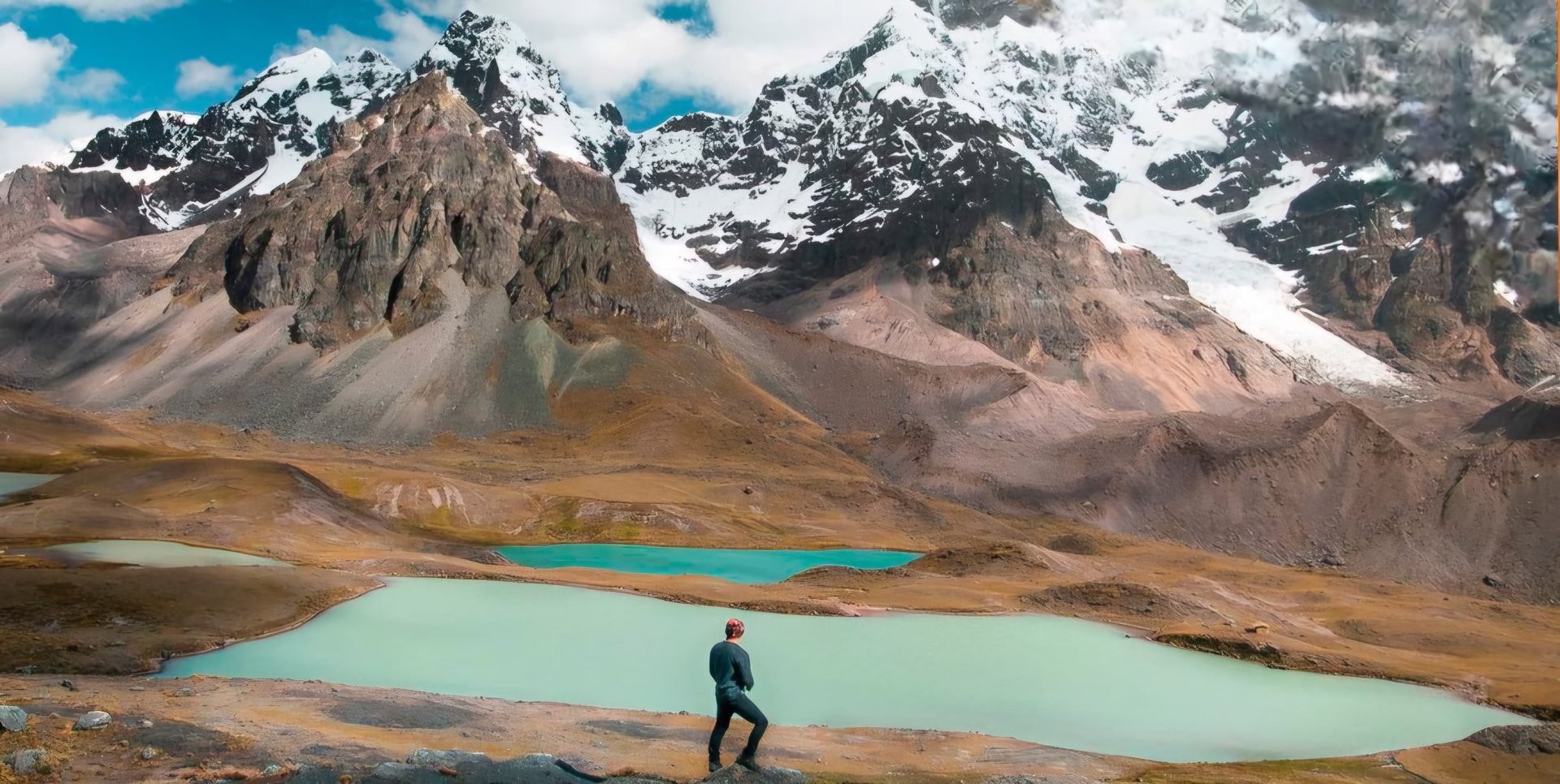 an abstract photo of a curved building with a blue sky in the background