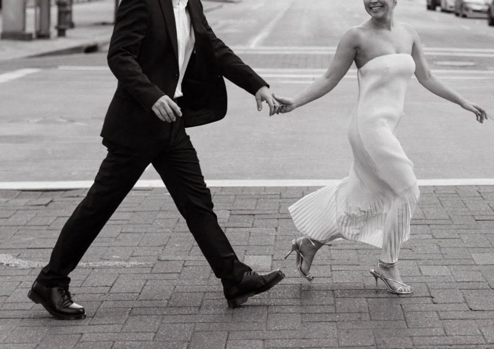 couple wearing silver-colored rings