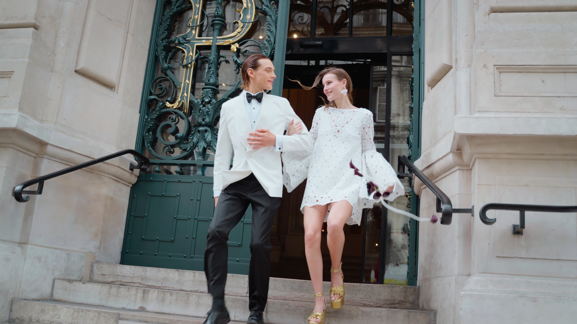 couple wearing silver-colored rings