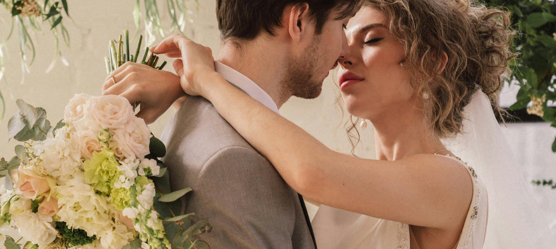 couple wearing silver-colored rings