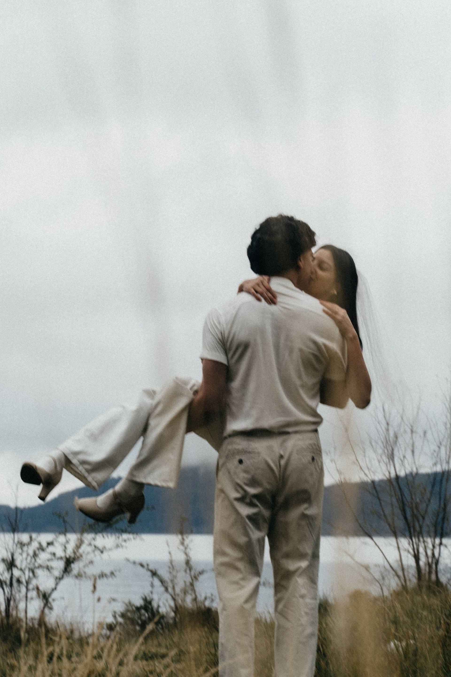 couple wearing silver-colored rings