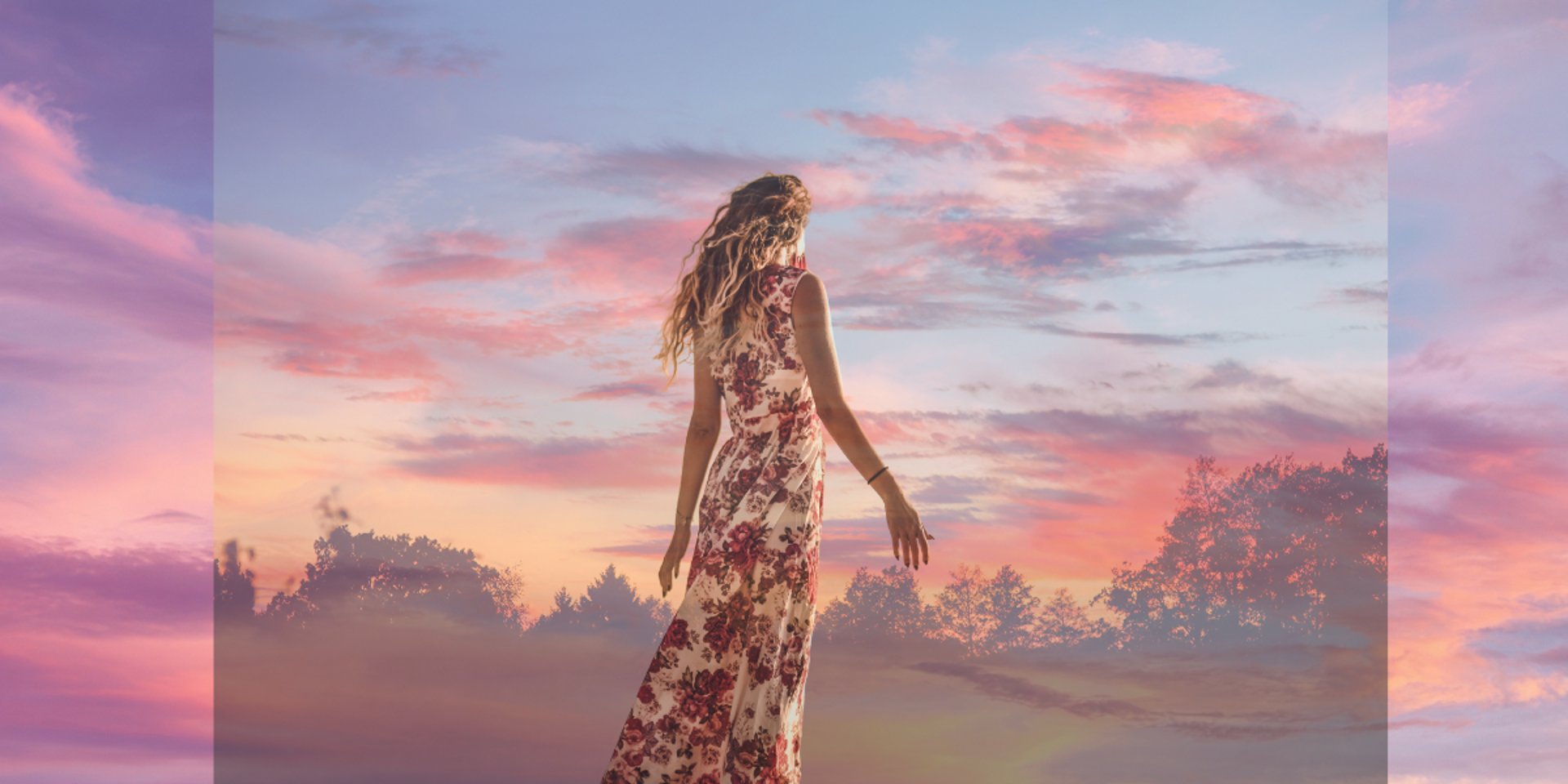 woman wearing yellow long-sleeved dress under white clouds and blue sky during daytime