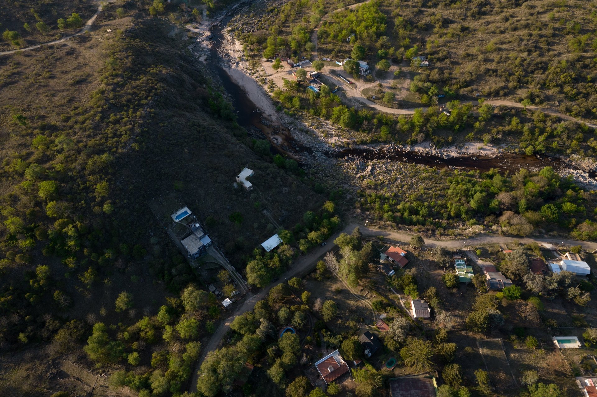 an abstract photo of a curved building with a blue sky in the background