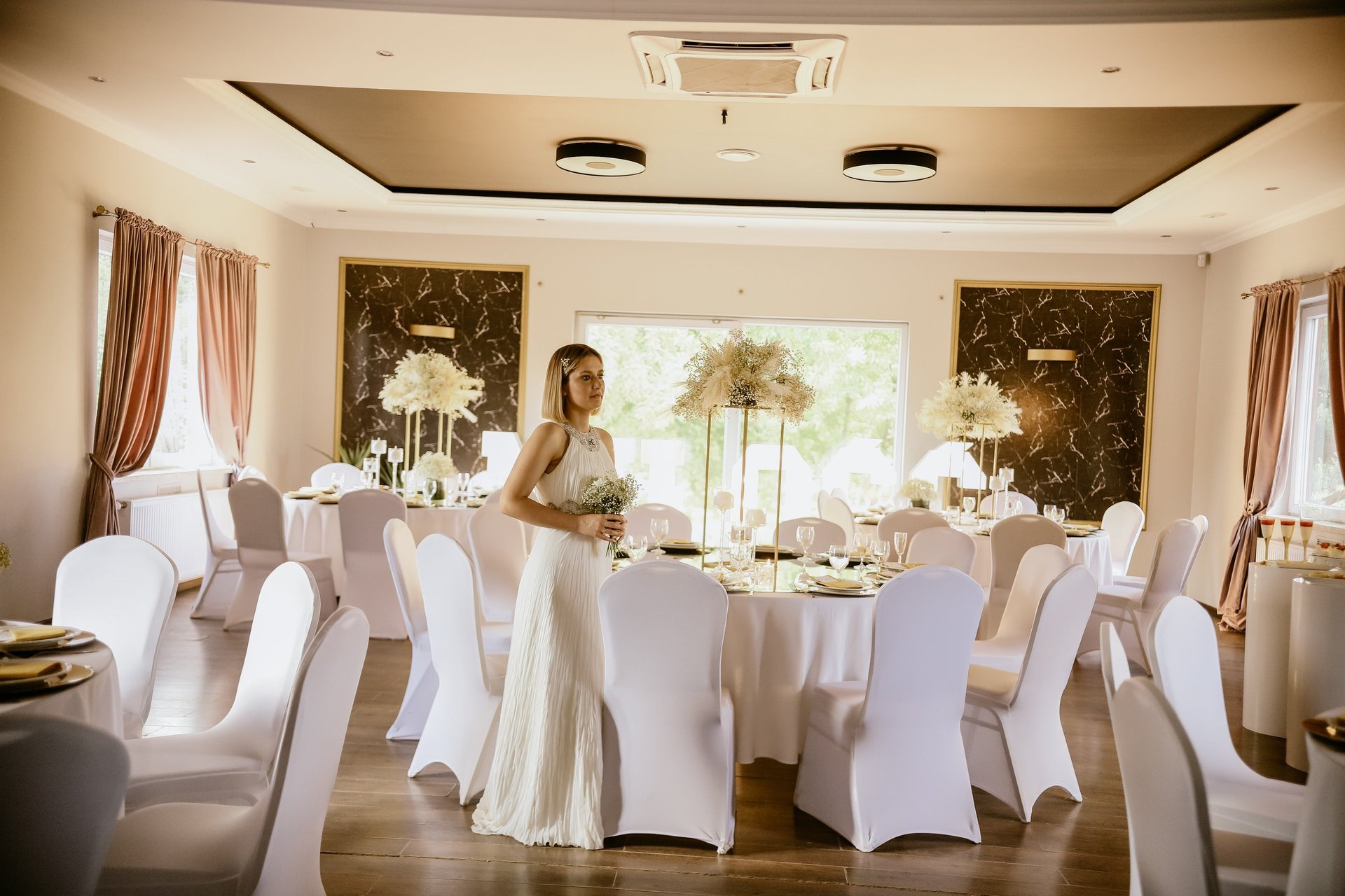 woman wearing yellow long-sleeved dress under white clouds and blue sky during daytime