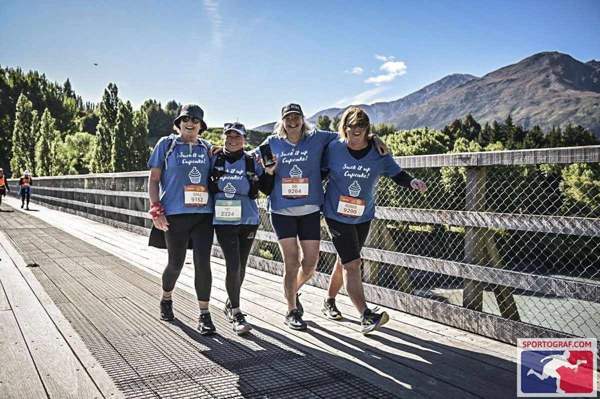 woman wearing yellow long-sleeved dress under white clouds and blue sky during daytime