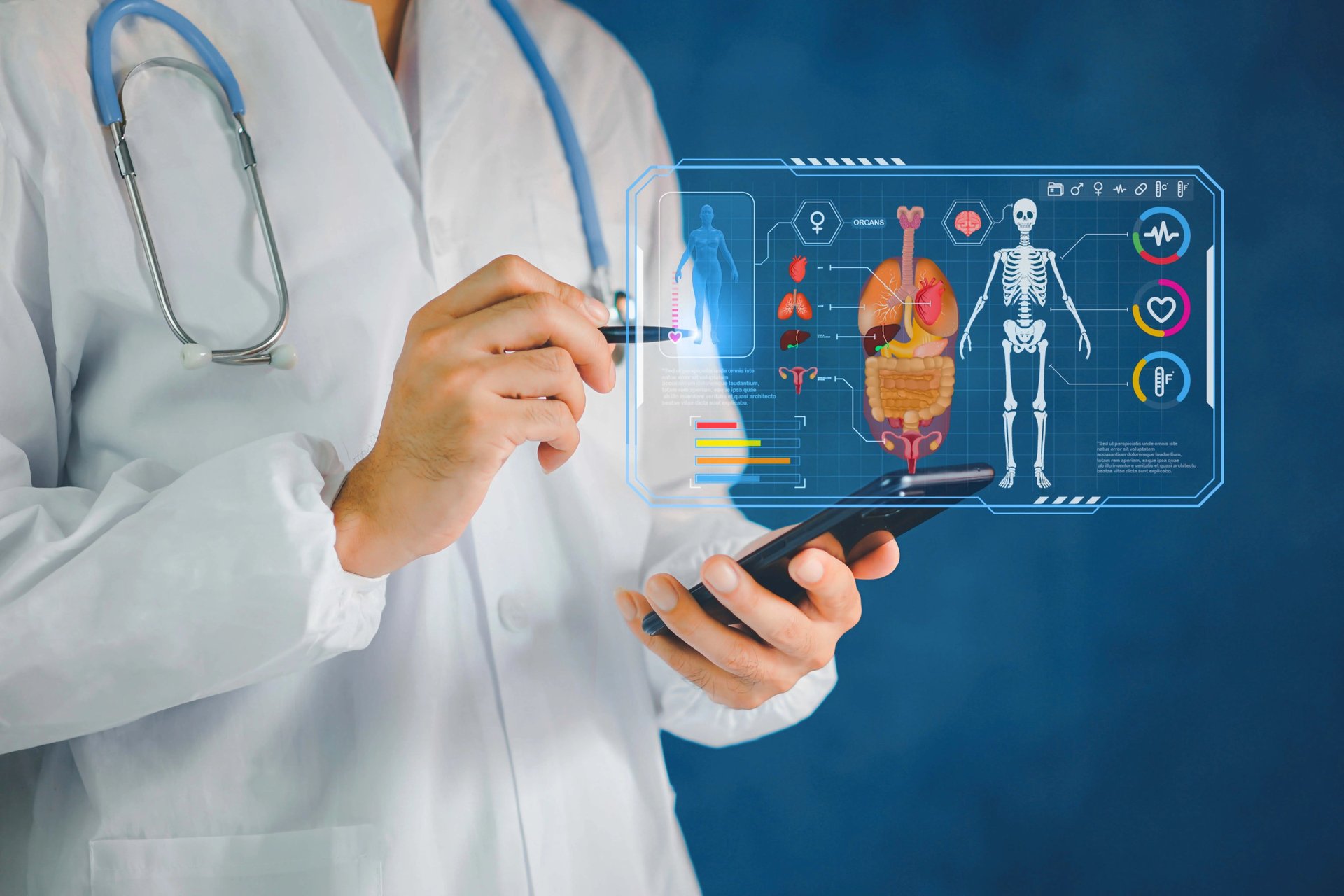person sitting while using laptop computer and green stethoscope near